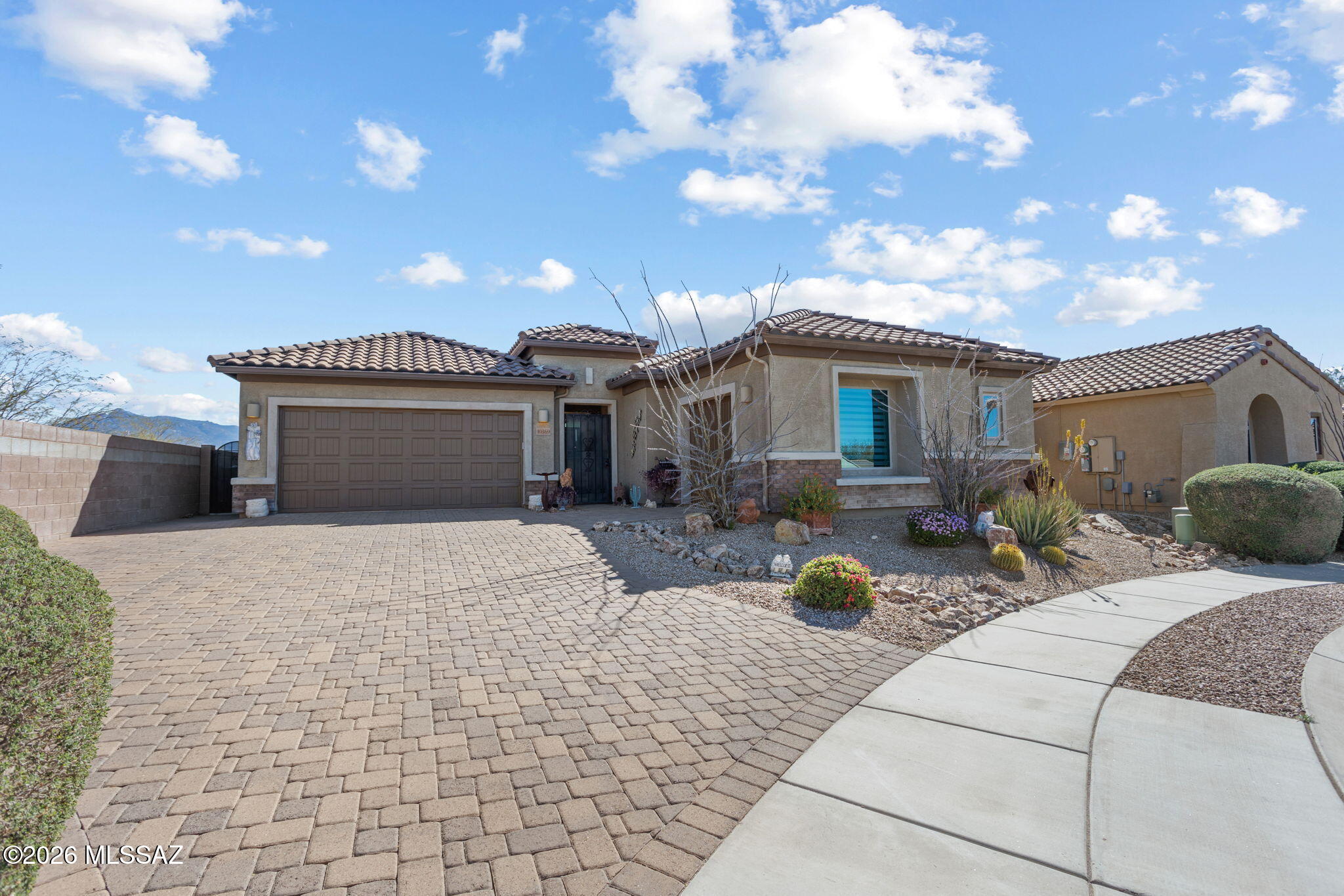 $2,000 available for painting allowance! Two bedrooms plus TWO dens / two and a half bathrooms. Full 3-car garage on a cul-de-sac lot. Enjoy the easy maintenance of consistent wood-look tile throughout, no carpet. 8' interior doors. The gourmet kitchen layout includes dove-tail, soft-close cabinets and gas cooktop. Built-in cabinets in the den. Custom window coverings and California Closet organizers. Soft-water system, reverse osmosis drinking water, and tankless water heater. Beautiful backyard with built-in BBQ, water feature, and citrus trees.