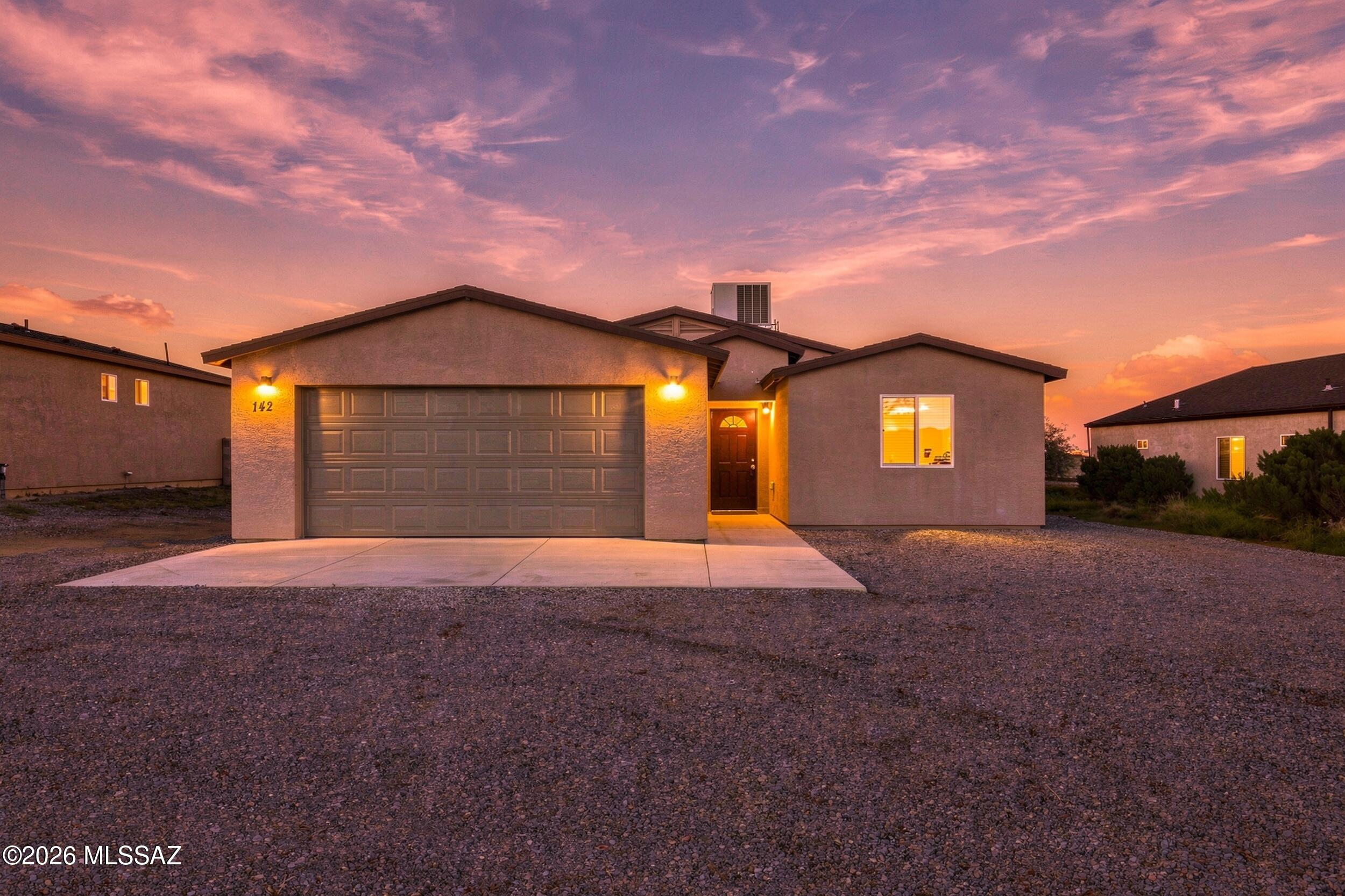 Brand NEW construction custom build turn-key Gem! As a move-in ready home, it features a large  .18 acre lot, NO HOA, privacy block wall, and beautiful mountain views! This contemporary style beauty is built with high quality materials, a 2 car extended length garage, and an appealing open concept. With convenient features such as marble-like ceramic flooring throughout, recessed lights, ceiling fans, and upgraded countertops. This home is roomy and bathes in natural light from the moment you step in! With an ample kitchen that has white custom cabinetry, gorgeous granite, new SS appliances, a pantry, and a breakfast bar to host guests. That Segways into your ample living room space for family gatherings. The primary bedroom is quite ample, has a true walk-in closet, & cooling ceiling fan. With an ensuite bathroom that has dual sinks with matching granite, and a premium walk-in shower where you can unwind in.. Enjoy family time or the company of your guests in your huge private backyard. Dream up your ideal oasis and bring it to life! Your home is only minutes away from parks, entertainment, restaurants, and the award-winning Vail school district. Don't compromise! Come see it, fall in Love and stay.