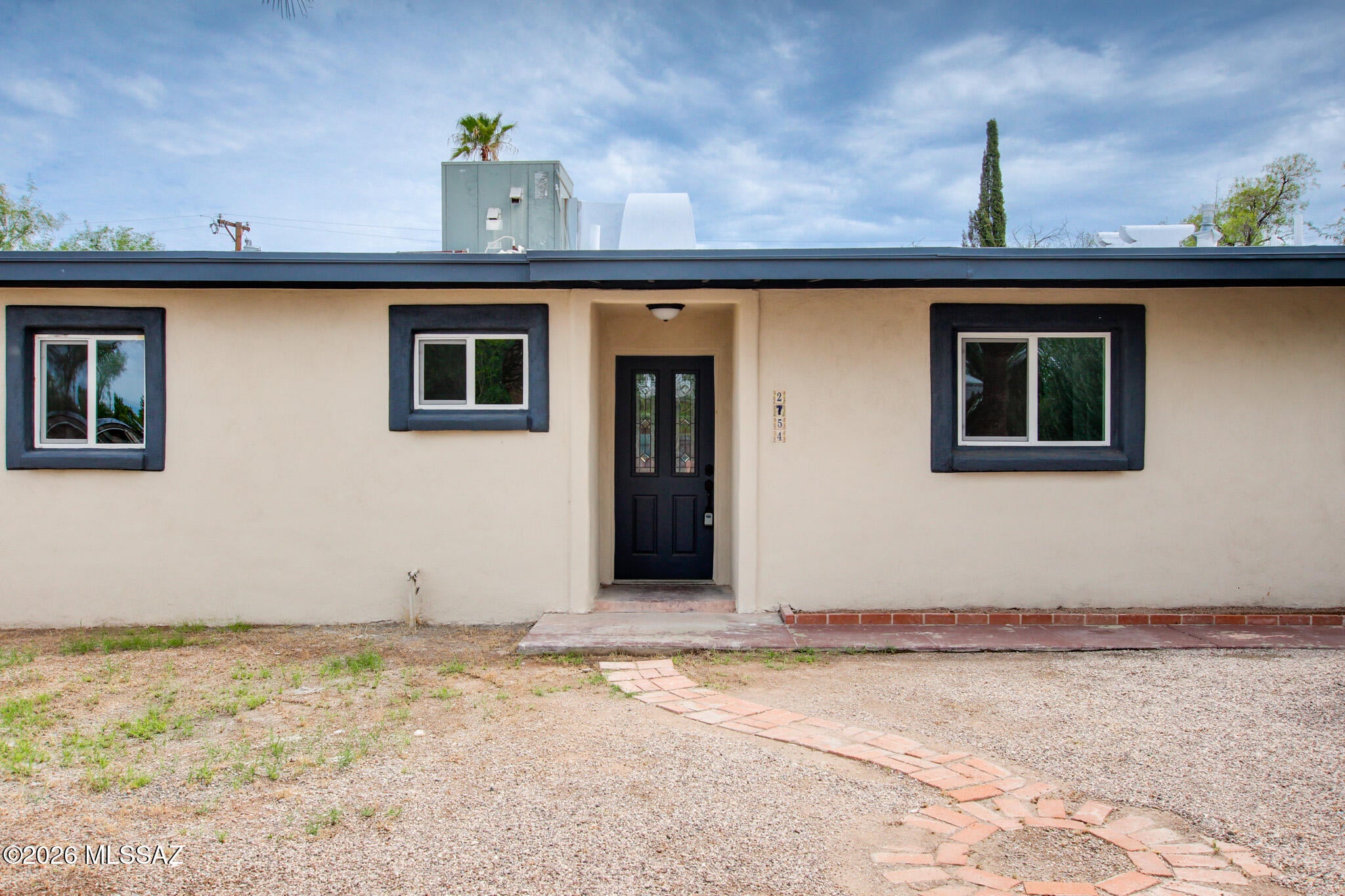 Welcome home! Originally built in 1955 and thoughtfully transformed through a massive remodel, this beautifully updated 5-bedroom, 3-bathroom home offers 2,308 square feet of comfortable, modern living in an established Central Tucson neighborhood.

Step inside to discover a bright, open floor plan designed for both everyday living and entertaining. The extensive updates bring a fresh, contemporary feel while maintaining the character and charm of the home's established setting.

Outside, a covered patio and generously sized yard provide plenty of space to create your ideal outdoor retreat. With room for a future pool, outdoor dining and seating, entertaining, or play, the possibilities are endless. Conveniently located near restaurants, shopping, recreation, and other attractions that make Tucson such a great place to call home, this thoughtfully remodeled property offers the space, flexibility, and location you've been looking for.