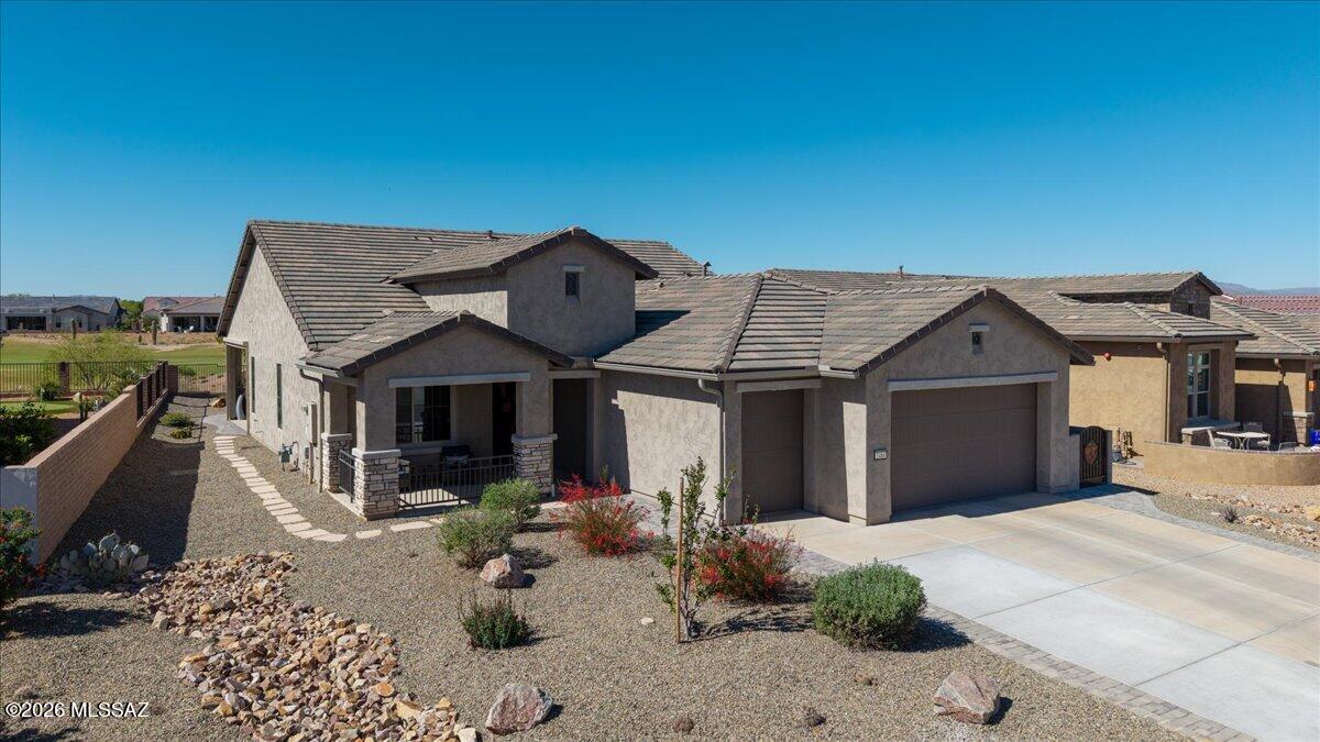 Luxurious Mandara 2 bedroom plus den, 2.5 bath home in prestigious Gated community of Quail Creek, offering resort-style living and stunning mountain views from your golf course lot. From the moment you arrive, the beautiful custom security door sets the tone for the elegant interior, welcoming you into a thoughtfully designed 1916 sq ft floor plan ideal for both everyday living and entertaining. The gourmet kitchen features quartz countertops, gas cooktop and convection oven, making it a dream for home cooks and entertainers alike. A versatile den provides the perfect space for a home office or hobby room, while the split-bedroom design ensures privacy and comfort for owners and visitors. Outside enjoy tranquil golf course vistas & mountain views. Extended 2.5 car garage. Built in 2022.