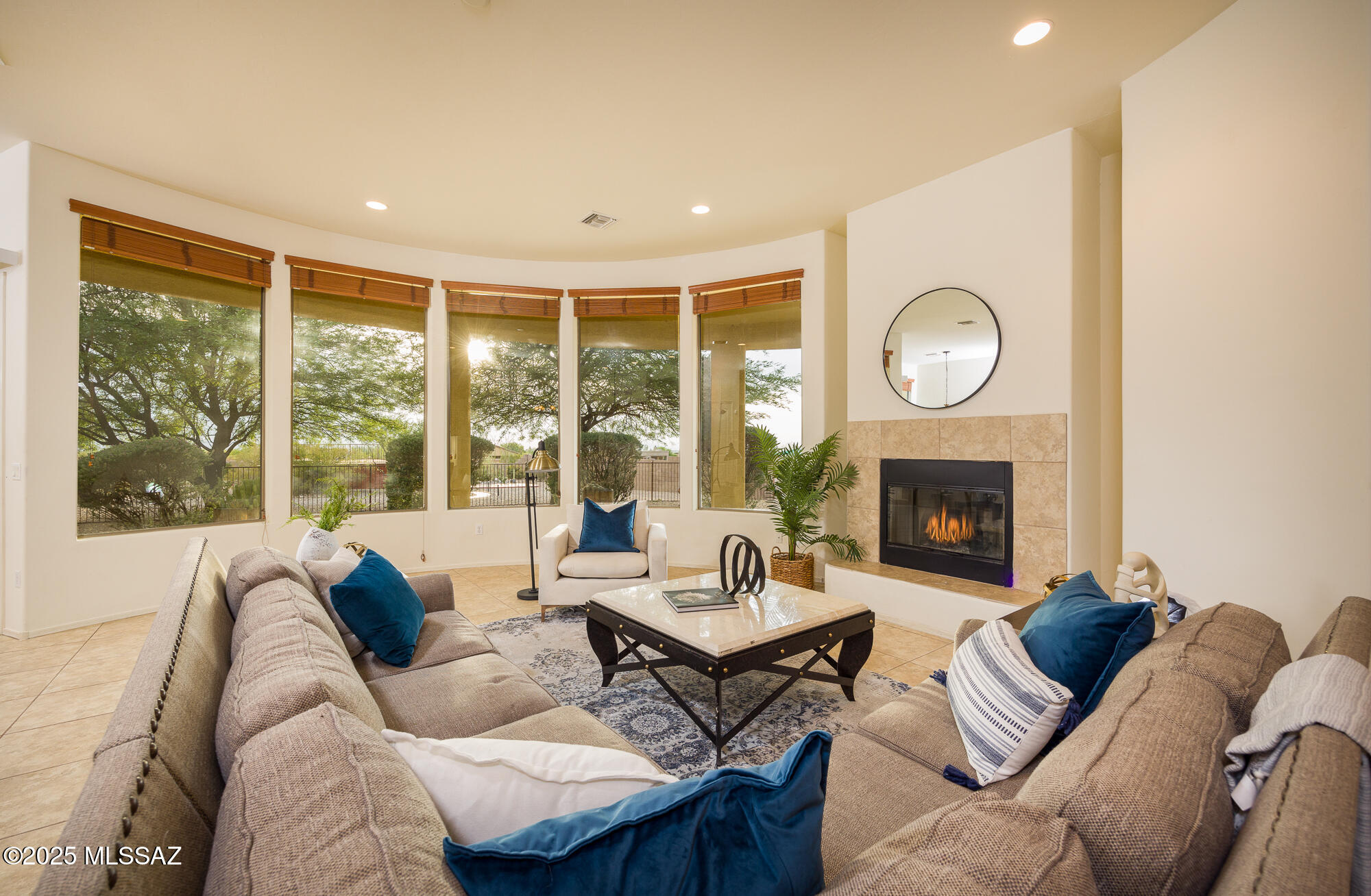 6 BED | 4 BATH | 4 LIVING AREAS | 3654 SQFT | DEEP 3 CAR | RV PARKING | .94 AC | SWIM SPA & WHIRLPOOL | Luxury, resort-like, soaring ceilings, arched wall of windows, open concept, spacious rooms. A tranquil retreat, yet perfect for entertaining. Kitchen w/dual ovens, work island & separate breakfast bar, granite, beautiful cabinetry, dual pantries. Formal LR, DR/Second Seating Area. Oversized 6th Bed can serve as Den/Office/Game Room/Gym/Generational-Living with separate professional entrance & bath. Primary suite w/ Japanese-Style soaking tub, separate shower, & walk-in closet. Generously sized guest rooms w/ sitting area/TV/Study/Gym, Jack-Jill Bath, walk-in-closets, Laundry room. Wrapped patio, walled yard swim-spa & whirlpool, deck surround, ramada, and amazing views!