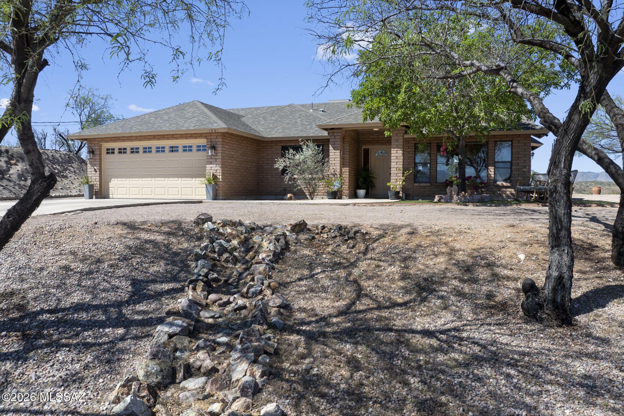 Beautiful home offering 3 bedrooms, 2 bathrooms, and 1,853 sqft of well-designed living space. Constructed with durable slump block this property is situated on a 1.17 - acre hillside lot, capturing stunning views and peaceful surroundings. Interior features include vaulted ceilings, engineered wood floor in living room, upgraded cabinetry, and a blend of quartz and granite countertops throughout. A perfect combination of comfort, quality construction, space and scenic living.