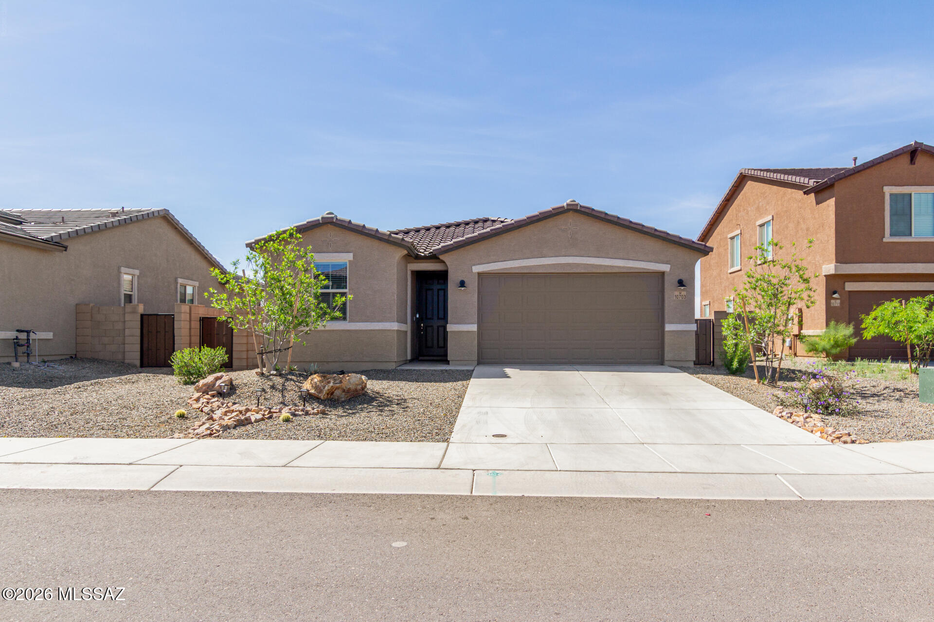 Richmond American Homes at its finest in the highly sought after Gladden Farms community! This beautifully maintained, like new residence offers the perfect blend of comfort, style, and functionality. Featuring a split floor plan consisiting of 3 bedrooms, 2 bathrooms, and a spacious 2 car garage with additional room for storage or even a side by side. This home is designed for both everyday living and effortless entertaining.

Enjoy added privacy with no neighbors behind or to the front, creating a peaceful setting. The professionally landscaped and low maintenance backyard showcases pavers and brand new upgraded KOOL Decking on the patio, ideal for children, relaxing and hosting gatherings. Oh, and don't forget those beautiful sunsets!