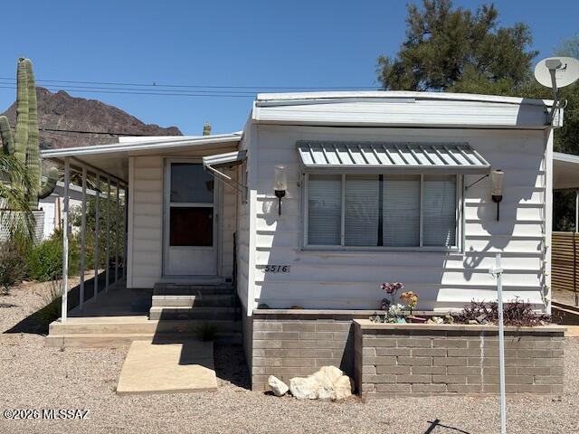 Fully furnished 2 bedroom 2 bath home with split bedroom floor plan. Living room has been bumped out and is large. Living room is open to the kitchen and dining area. Kitchen has plenty of stocked cabinets and ready for that next owner to enjoy. Located in an active 55+ community, the HOA fee includes unlimited golf, tennis, pickleball, shuffleboard, pools, spa, fitness center, trash service, and much more. Best of all--you own the land. This is carefree living at its finest.