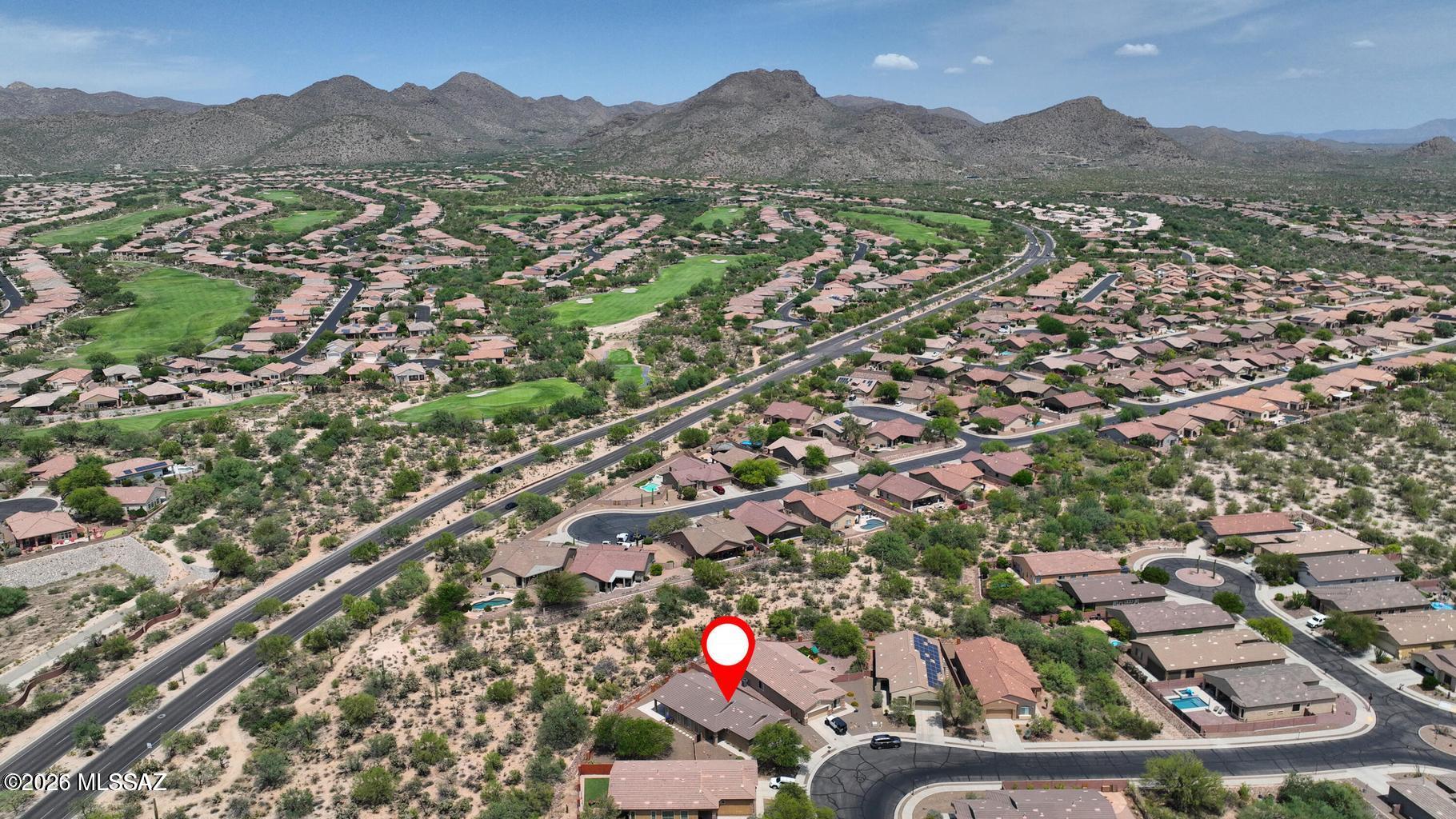 Big-ticket items? Already done. This home comes with a brand-new roof with a 5-year warranty and a 2-year-old HVAC system, now at an amazing new price. It sits on one of the best lots in the gated community of The Preserve at Dove Mountain: a rare, private .25-acre pie-shaped homesite that carried a $100K+ lot premium, with the kind of privacy you simply can't find in new construction today. The oversized backyard is ready for whatever you dream up: lounging, entertaining, or adding your own resort-style pool. Inside, the wide-open 4BR/2BA floor plan shines with pop-outs in both the great room and dining room for extra space and light. The kitchen is ready to impress with brand-new white quartz countertops (never used!) and new stainless appliances (all except the range). AGENTS FAVORITE.