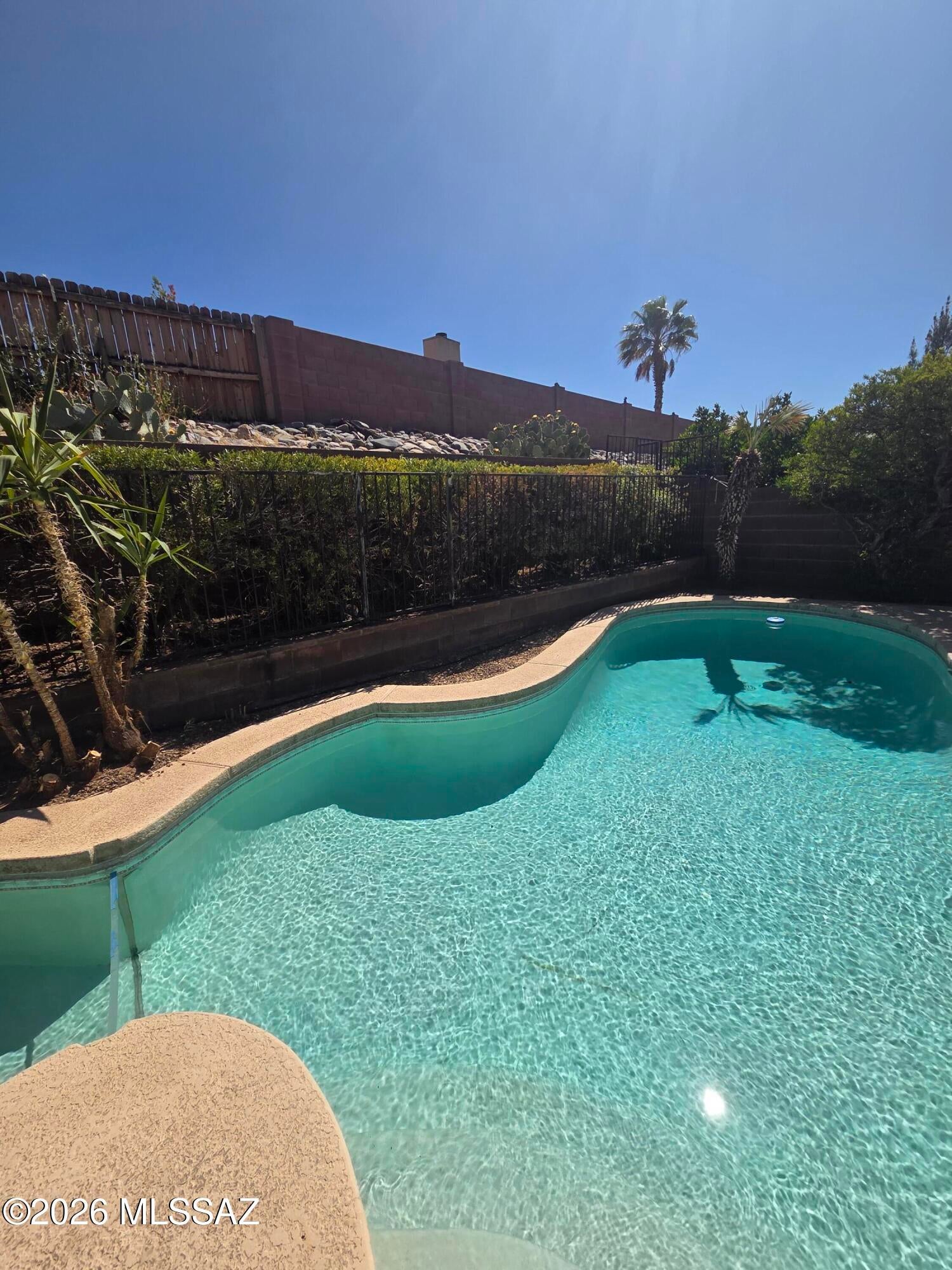 PRIVATE POOL!! Close to park, shopping and more! Spacious 3bdr/2ba home on eastside of Tucson. Property has formal living room, and dining room. Family room off kitchen with cozy fireplace. Enjoy your fenced backyard w/covered patio and sparkling private pool! 
**No Spa - pool spa heater does not work.**
