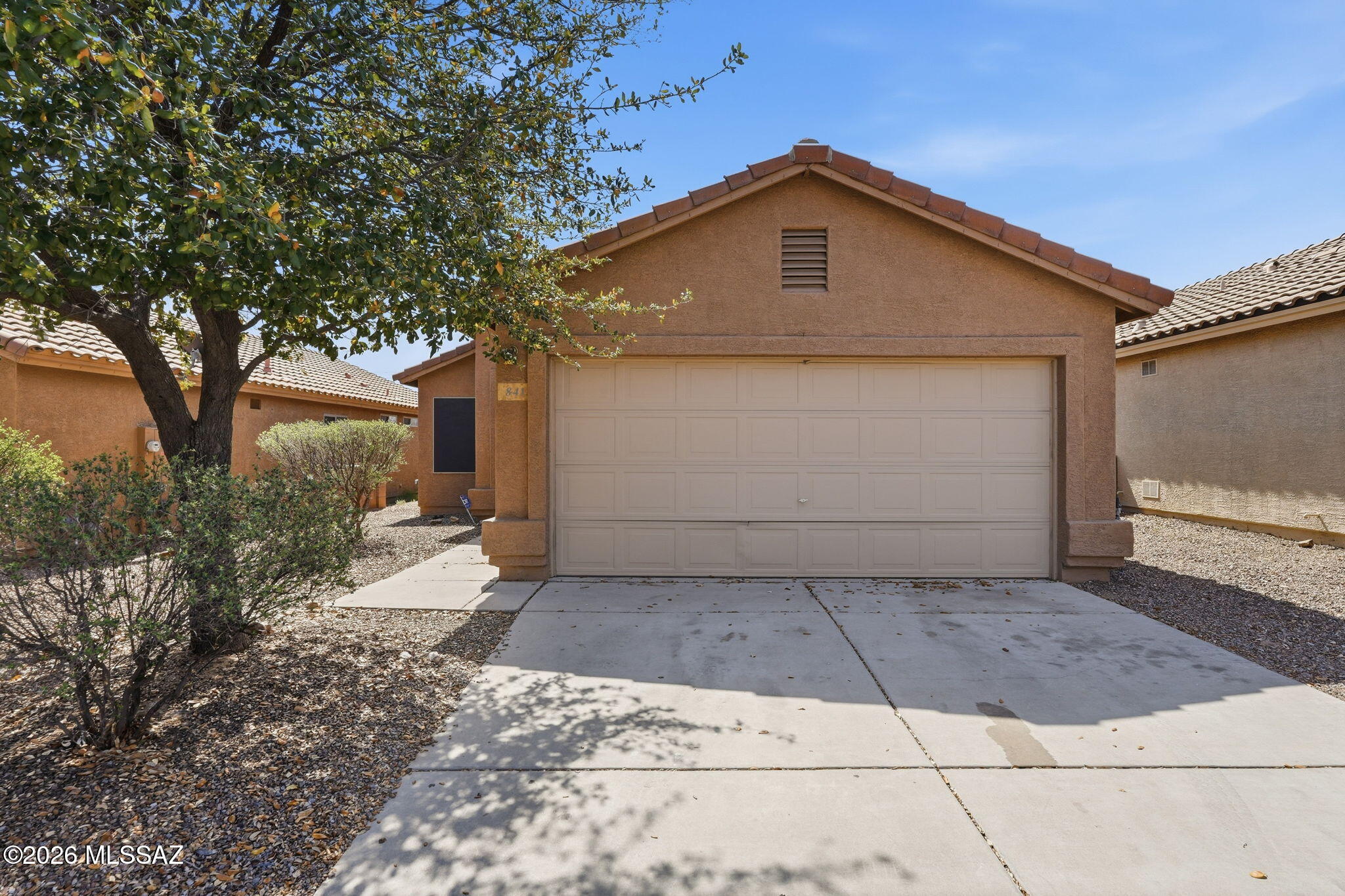 Welcome to this well-maintained 3 bedroom, 2 bathroom home in the desirable Los Arroyos community of Green Valley. This home offers a comfortable and functional layout with thoughtful upgrades throughout. Enjoy solar screens that help keep the home energy efficient and comfortable year-round. Step outside to a beautiful backyard with upgraded pavers, perfect for relaxing or entertaining. With no rear neighbors, you'll appreciate the added privacy and peaceful desert views. Conveniently located just minutes from shopping, dining, and everyday amenities, this home combines comfort, privacy, and location in one great package. Don't miss this opportunity!