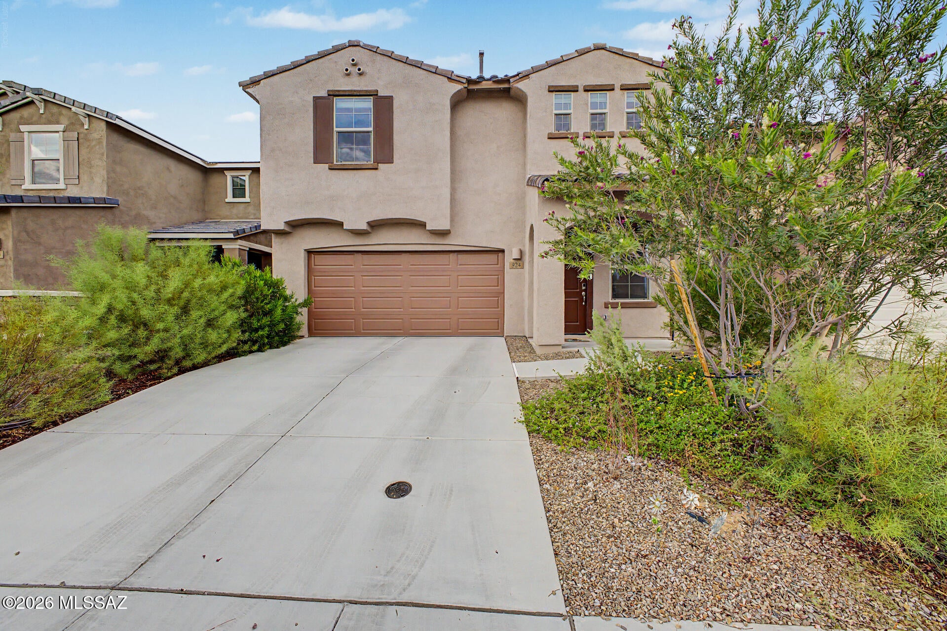 Fantastic opportunity to own this delightful 3-bedroom property in Entrada Del Pueblo! You'll be delighted by the spacious great room wth high ceilings, a soothing palette, recessed lighting, blinds, and attractive wood-look flooring. The gourmet kitchen features quartz counters, white shaker cabinets with crown moulding, chic pendant lighting, a stylish tile backsplash, stainless steel appliances, a walk-in pantry, and an island with a breakfast bar. Upstairs, you'll find a cozy loft that provides a versatile space for work or relaxation. The primary bedroom showcases soft carpeting, an ensuite with dual sinks, and a walk-in closet. Imagine peaceful afternoons in the charming backyard, boasting a covered patio, well-laid pavers, and pristine artificial turf. Make this gem yours now!