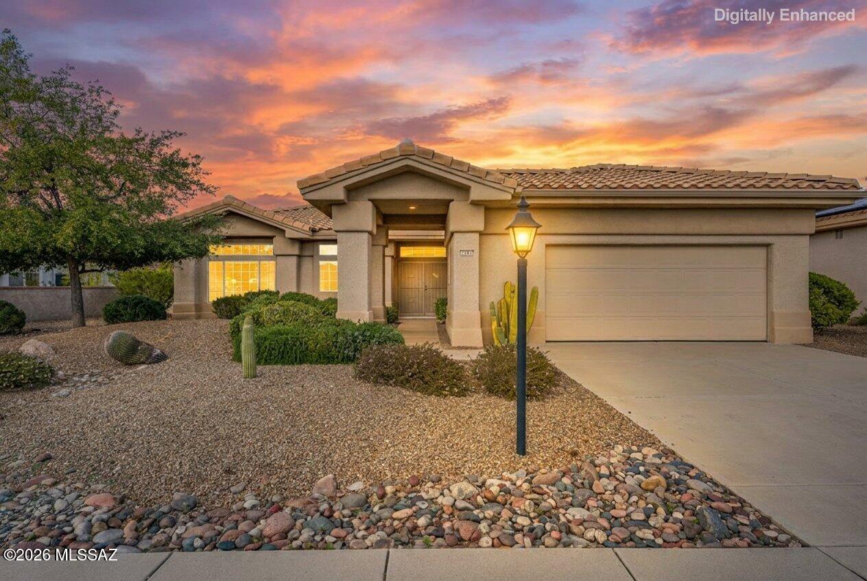 Located in the highly desirable Sun City Rancho Vistoso active adult community, this beautiful home will be hitting the market in late February. Residents enjoy a championship golf course, resort-style clubhouse, fitness center, walking trails, and a full calendar of social activities that define Arizona resort living. Inside, tall 10-foot ceilings enhance the open floor plan with a spacious kitchen featuring an island, stainless steel appliances, and 42-inch cabinets with roll-out shelving. The home offers both a formal living area and a family room with gas fireplace. The large primary suite includes a private door to the backyard and a spa-style bathroom with dual sinks, separate garden tub, and walk-in shower with seat.  The private backyard offers a covered patio and extensive pavers