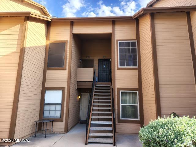 Charming 2-bed, 2-bath condo oasis in the heart of Tucson's Village at Midvale Park!  Step into this bright, 1,005 sq. ft. retreat where sunny Arizona living feels effortless. Offers a single-level layout with generous rooms, two full baths, and a private patio perfect for morning coffee under the desert sky.  Inside, you'll find a functional floor plan with ample natural light, and a cozy vibe that invites you to make it your own. Covered parking, in-unit laundry hookups, and low-maintenance living mean more time to enjoy the community pool, nearby parks, and quick freeway access to shopping, dining, and downtown Tucson.