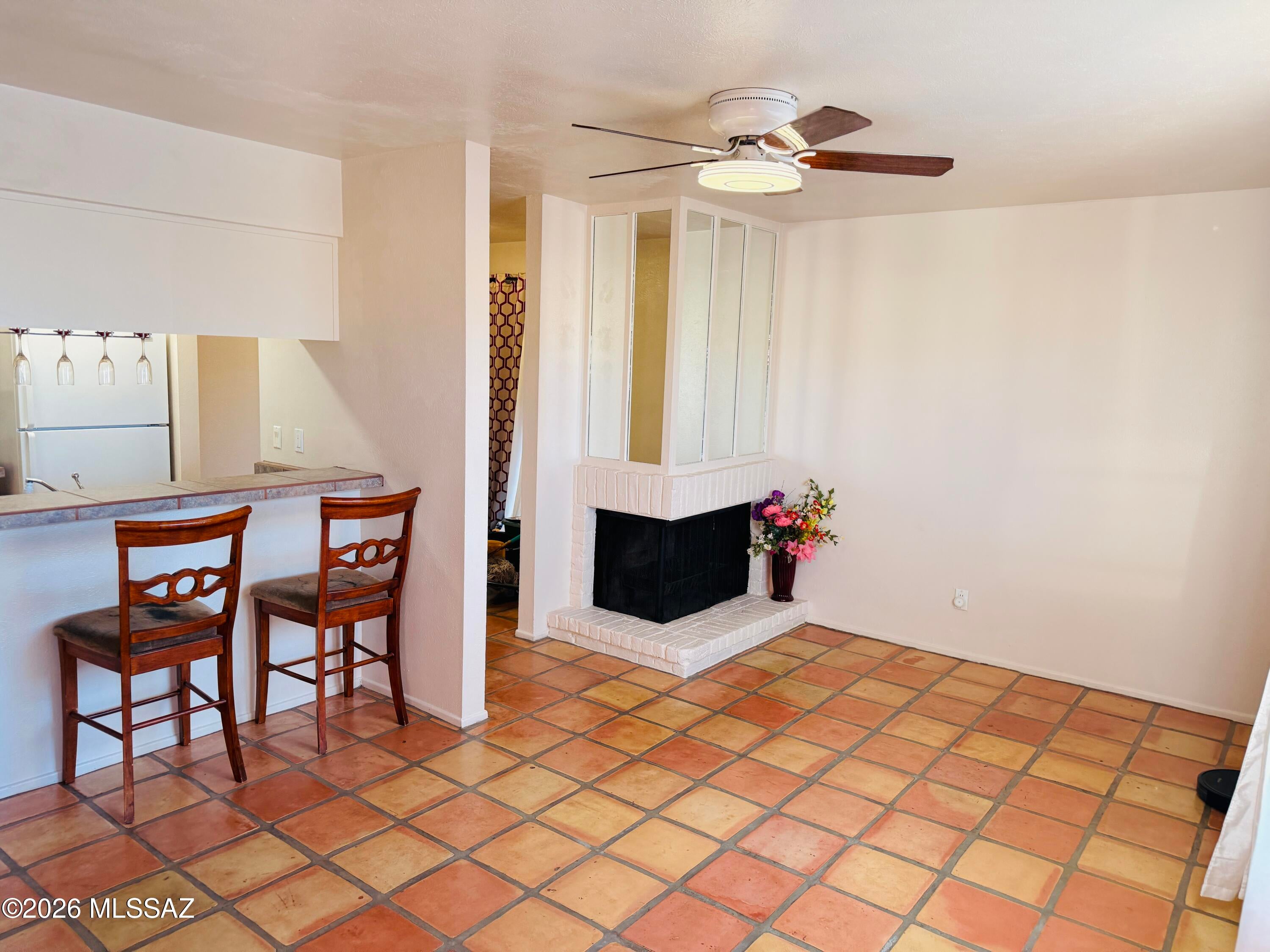 Welcome to this charming 1-bedroom, 1-bath condo offering comfort, convenience, and beautiful mountain views! Inside, you'll find Saltillo flooring throughout the main living areas with cozy carpet in the bedroom, abundant natural light, and ample storage throughout the unit. The kitchen features tiled countertops, a breakfast bar, and connecting to the living space, making it perfect for everyday living or entertaining!

The spacious bedroom includes a walk-in closet, while the bathroom showcases a tiled shower and matching tiled countertops. Step outside to enjoy your private balcony!

Additional features include A/C, electric to the unit, and one assigned covered parking space. Residents also enjoy access to two sparkling community pools, Laundry Facilities, and Lush landscaping!