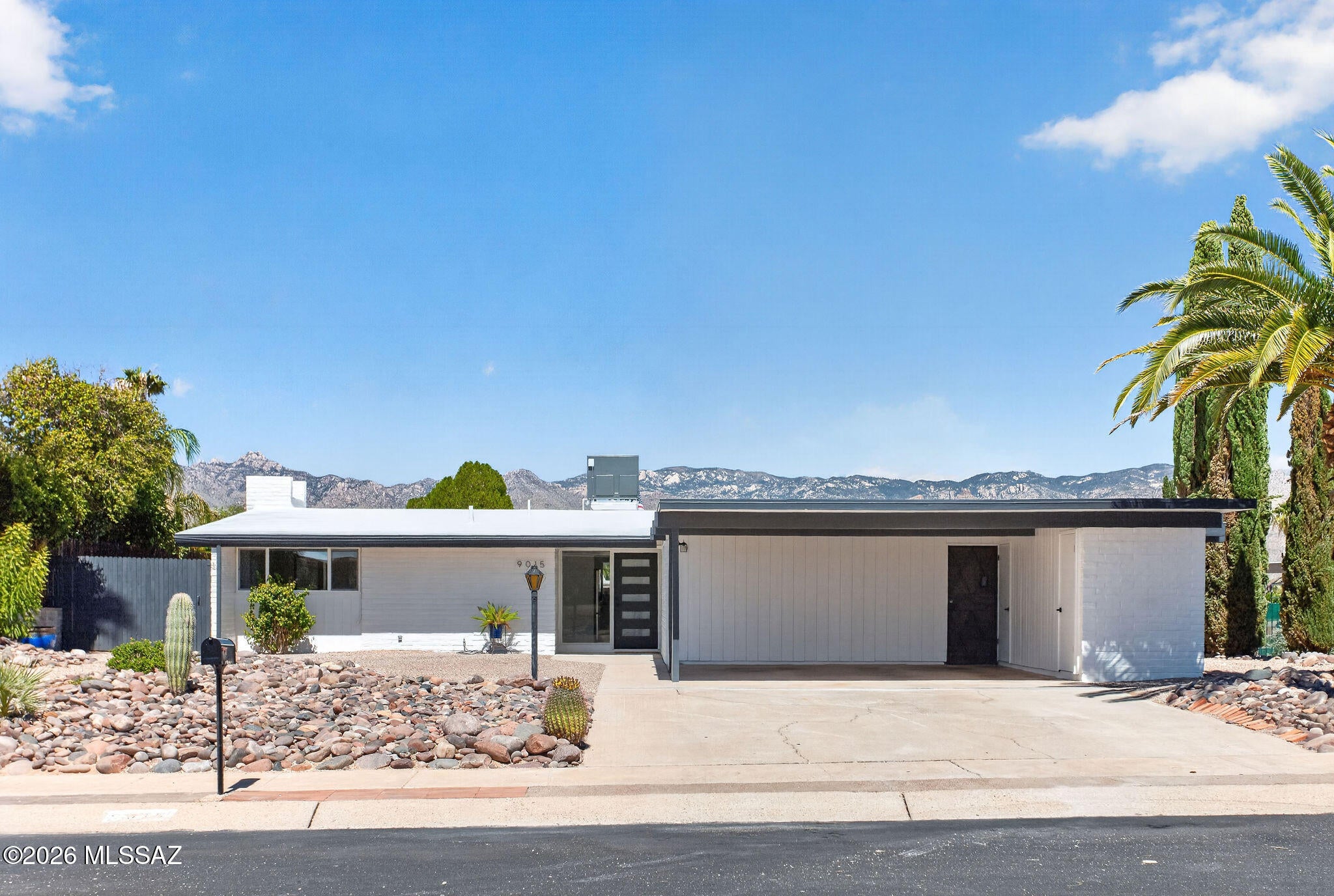 Beautifully updated home offering almost 2,100 sq. ft. with 4 spacious bedrooms and incredible mountain views! One bedroom features a separate exterior entrance, making it ideal for a guest suite, home office, or private workspace. The large family room features a corner fireplace and a wall of windows showcasing the mountain views.
The newly remodeled kitchen features brand-new soft-close cabinetry with new hardware, quartzite countertops, custom backsplash, recessed lighting, slide-in range, built-in microwave, French-door refrigerator, dishwasher, and large single-bowl sink with spray faucet. Luxury vinyl plank flooring runs throughout the main living areas, with new carpet and extra-thick padding in the bedrooms. Both bathrooms have been beautifully remodeled with with quartz countertops, undermount sinks, updated plumbing fixtures, framed mirrors, upgraded lighting, and tiled shower surrounds. Additional interior improvements include a modern front door, new solid core interior doors and hardware, mirrored closet doors, and fresh interior paint.
Major improvements include a new HVAC system, completely new roof, new main water line, water heater, mostly new dual-pane windows, all-new sliding glass doors, and fresh exterior paint.
The large backyard (almost a ¼ of an acre lot) offers incredible mountain views, a block wall, brick paver patio, and covered patio with plenty of room for outdoor entertaining. Conveniently located near shopping, restaurants, schools, hospitals, and everyday amenities.
Extensively updated inside and out with major improvements already completed--move in and enjoy!