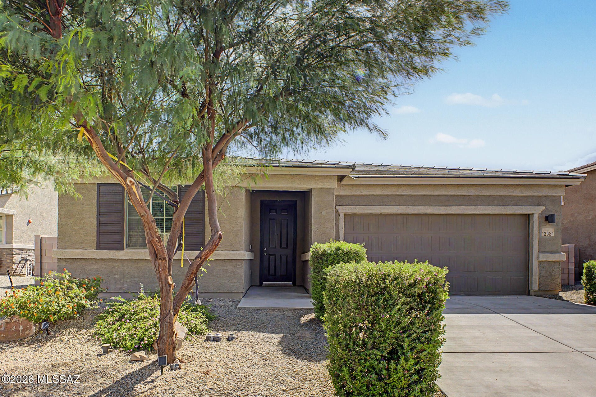 Seller shall accept or counter offers between  $397,000-$410,000. Welcome to this beautiful 4-bedroom, 3-bathroom home! Enter to see an open layout enhanced by tile flooring, neutral paint, and recessed lighting that fills the home with a bright, inviting atmosphere. At the heart of the home is a stylish kitchen featuring elegant pendant lighting, a classic subway tile backsplash, sleek gray cabinetry, built-in stainless steel appliances, granite counters, and a spacious walk-in pantry. Double doors lead to the serene main bedroom offering an ensuite complete with dual sinks, a glass-enclosed shower, and a generous walk-in closet. Discover a blank canvas backyard with a covered patio, ready for you to design your ideal outdoor oasis. You don't want to miss this fantastic residence!