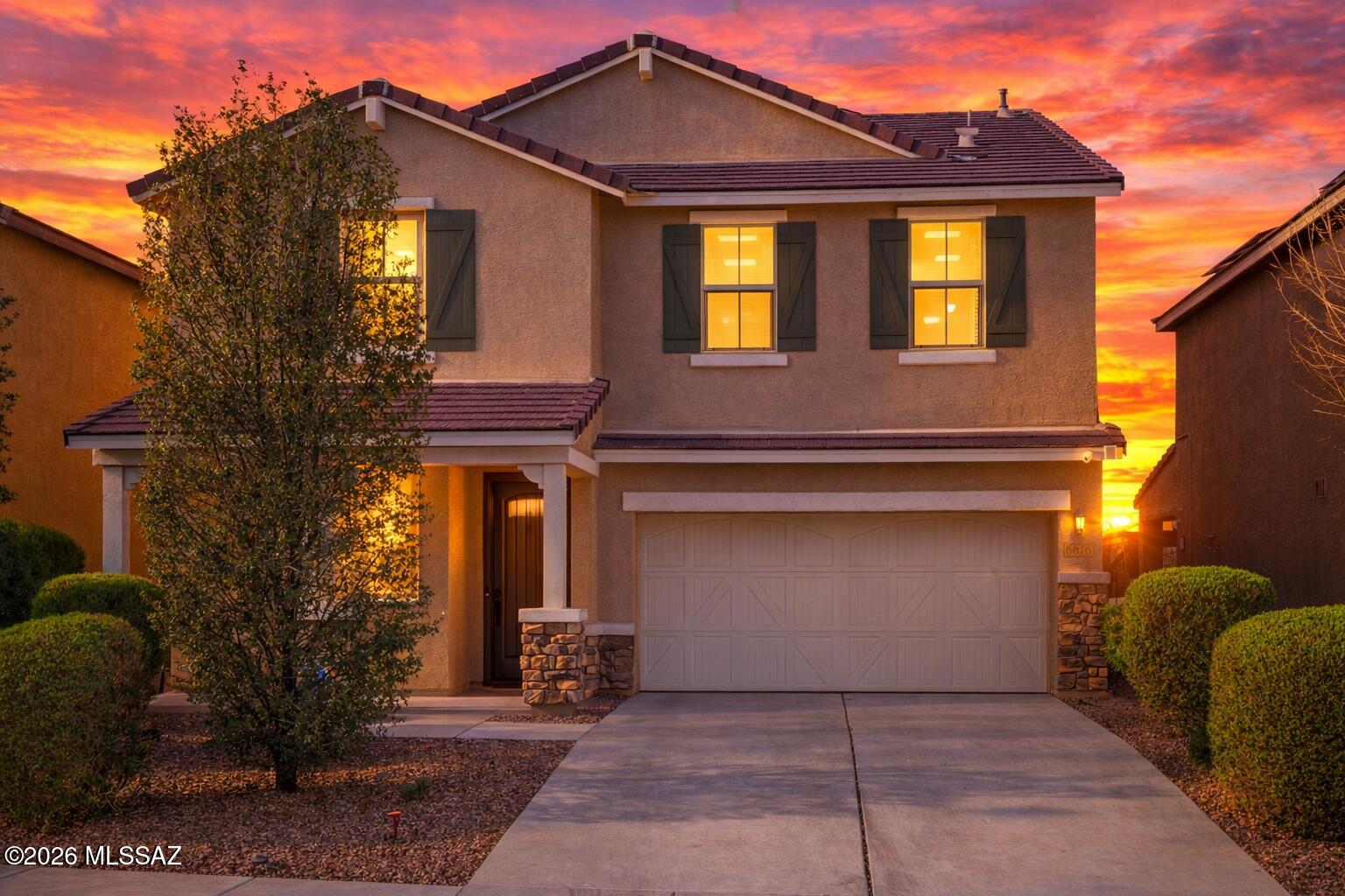 Welcome home to your 4 bedroom + office + loft retreat located in the award winning Vail School District, with a VA assumable 3.25% (3.3% APR) VA loan. The heart of this home is an incredible backyard - one of the largest in the community - with turf, pavers, hot tub and extended covered porch. An open concept floorplan with quartz countertops in the kitchen, an upstairs loft/game room, and mountain views. Just steps away from a community park with pool and splash pad. Special split stair design for one split bedroom. This beautiful, thoughtfully upgraded home is move-in ready for you. Located in the highly desirable La Estancia community where you will love the great selection of schools available within the sought after Vail School District. La Estancia has direct access to 'The Loop', an interconnected system of more than 130 miles of paved pathways and bike lanes, as well as two community pools, splash-pad, basketball court, pickleball courts, playgrounds, and more than 8 beautiful parks. La Estancia is within close proximity to many major employers, including Davis-Monthan AFB, Tucson International Airport, UA Tech Park, Raytheon and Amazon. Call for your private showing of this stunning home today!