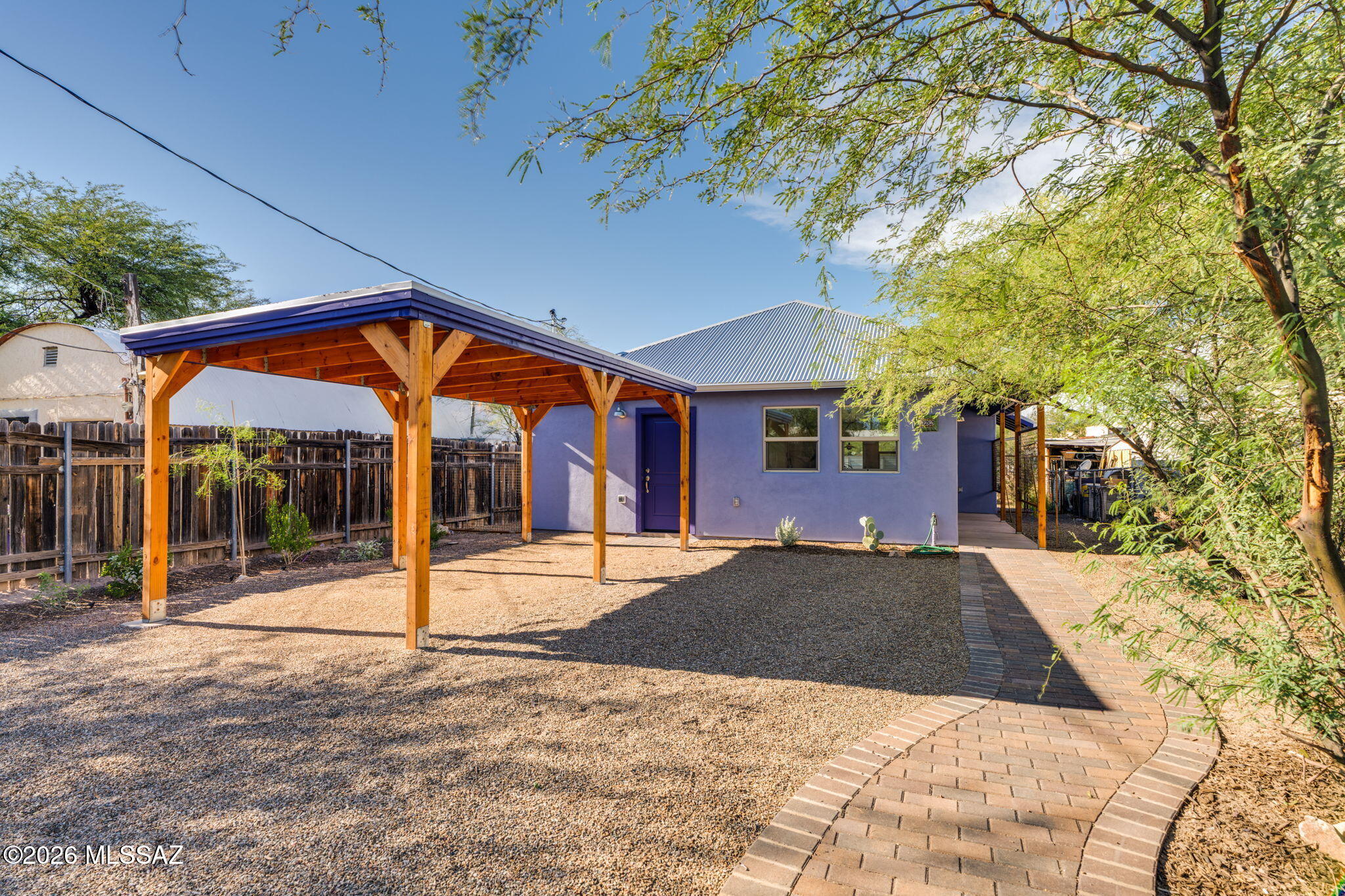 Seller will accept, or counter offer, between $195,000 and $247,000.  NEW CONSTRUCTION.  Pima County Community Land Trust's newest affordable homeownership opportunity is a beautifully built green home in historic Barrio Kroeger Lane.  Designed with comfort, efficiency, and low-maintenance living in mind.  NEW CONSTRUCTION.  This charming 2 bedroom/1 bath home features sleek concrete floors, a metal roof and a carport.  Sustainable features include an on-demand water heater, fully plumbed greywater system, gutters and thoughtfully designed basins with low-water native plants--perfect for enjoying Tucson living with eco-conscious style.  Easy freeway access, close to downtown, the Mercado District, The bike loop and the Sun link Stop.  HURRY, this one won't last.