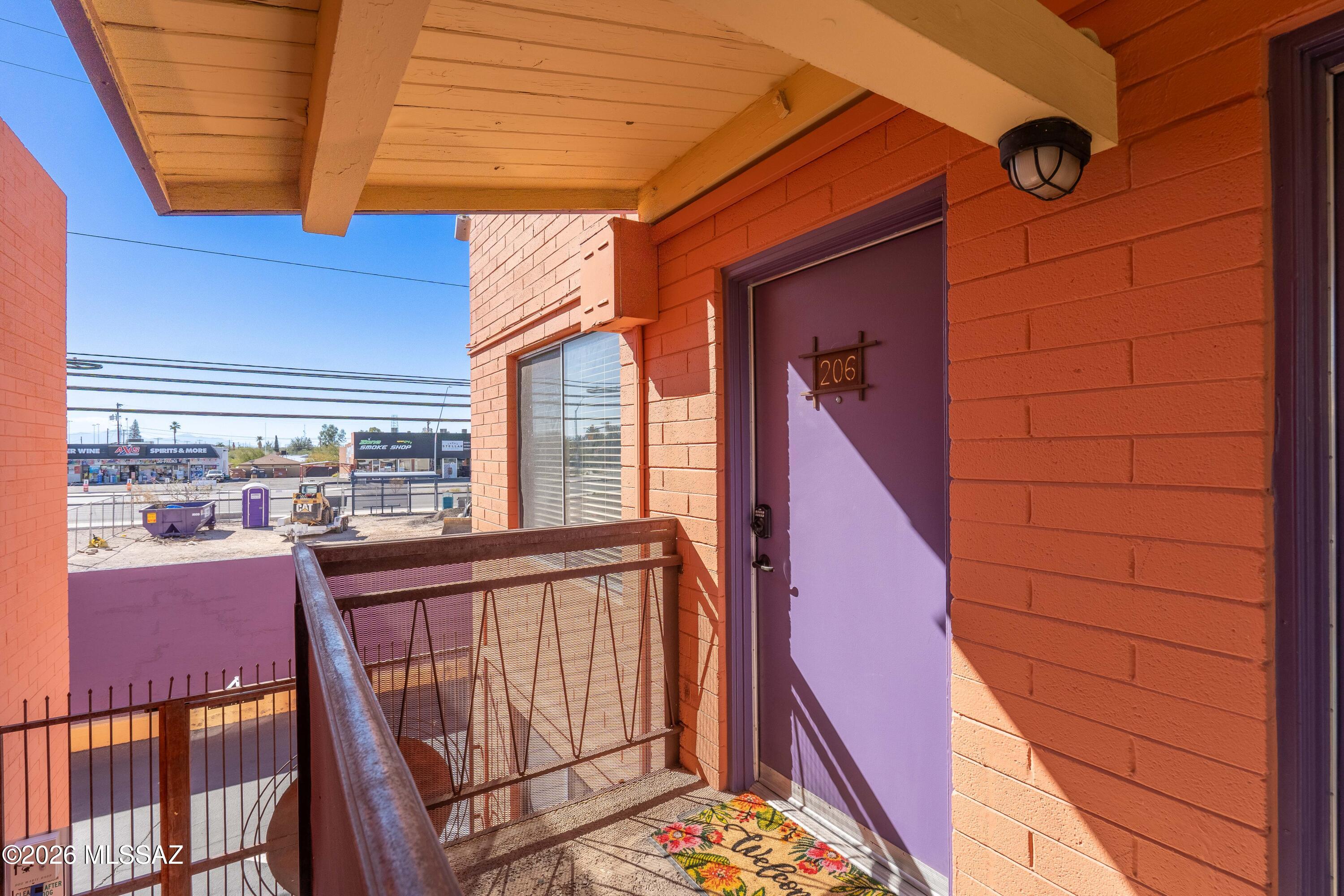 Rare opportunity to own a fully furnished 3-bedroom, 2-bath, two-story condo in the gated 10th Street Condominiums, just a short walk to the UofA campus. Unlike most units, this home is being offered fully furnished, making it truly move-in ready and ideal for a primary residence, student housing, or investment. Designed for both style and practicality, the unit features easy-care concrete flooring throughout, rich alder cabinetry in the kitchen, granite countertops, and stainless-steel appliances. Bathrooms have been updated, and a convenient laundry closet includes a stackable washer and dryer. A newer A/C adds comfort and efficiency. Enjoy secure gated access, well-maintained  landscaping, a sparkling pool & BBQ area. A unique, turnkey offering in an unbeatable location