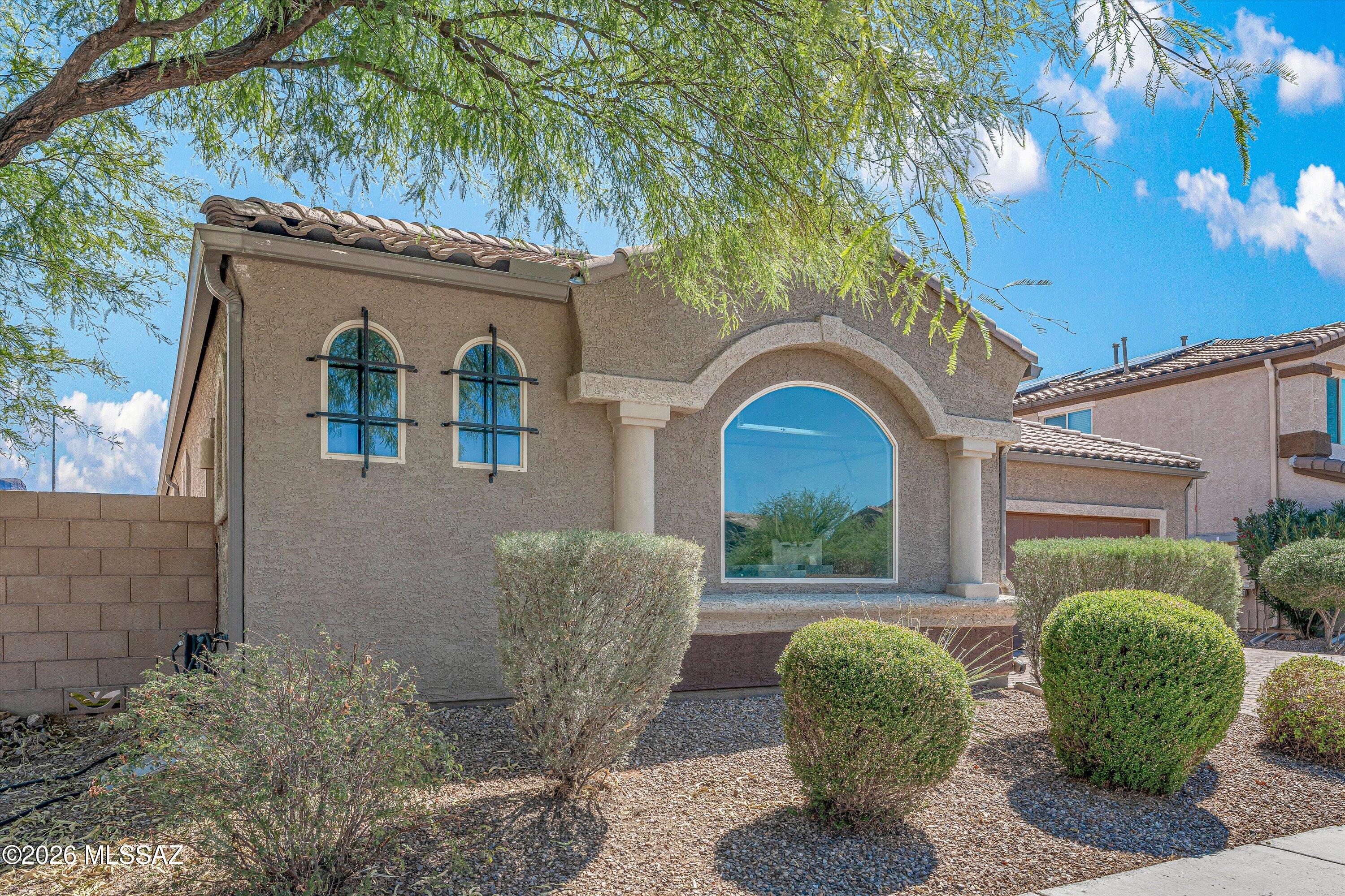 Motivated Seller!!Welcome to this stunning 4 bedroom 3 bath, plus den home. Incredible Mountain Views, and nestled in the scenic Saguaro Bloom community of Marana.  The versatile floorplan features high ceilings, an abundance of natural light with an open-concept design. Spacious Primary suite with double vanity, walk-in shower and large closet. The kitchen boasts island/breakfast bar, gas range and SS appliances. Step outside to the beautiful backyard with covered patio, pavers, basketball court and low care turf and amazing views!
Enjoy Saguaro Bloom's resort style amenities including a refreshing pool, splash pad, parks and fully equipped fitness center. Come take a view!