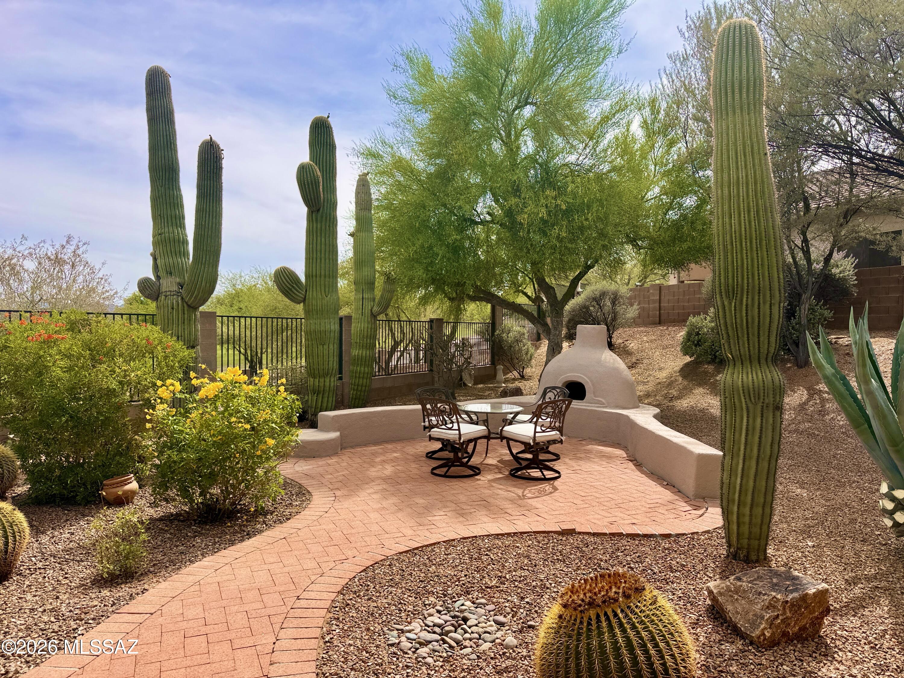 Whether it's morning coffee before work, a quiet place to read, or gathering around the kiva f/p with family or friends, this outdoor space was designed to be enjoyed! Welcome to the gated community of the Bluffs where this 3BD/2BA 2040s/f house, offers an open floor concept with room to relax. Enjoy low maintenance landscape, privacy from neighbors and a backyard that grows more impressive with time! Come see for yourself!