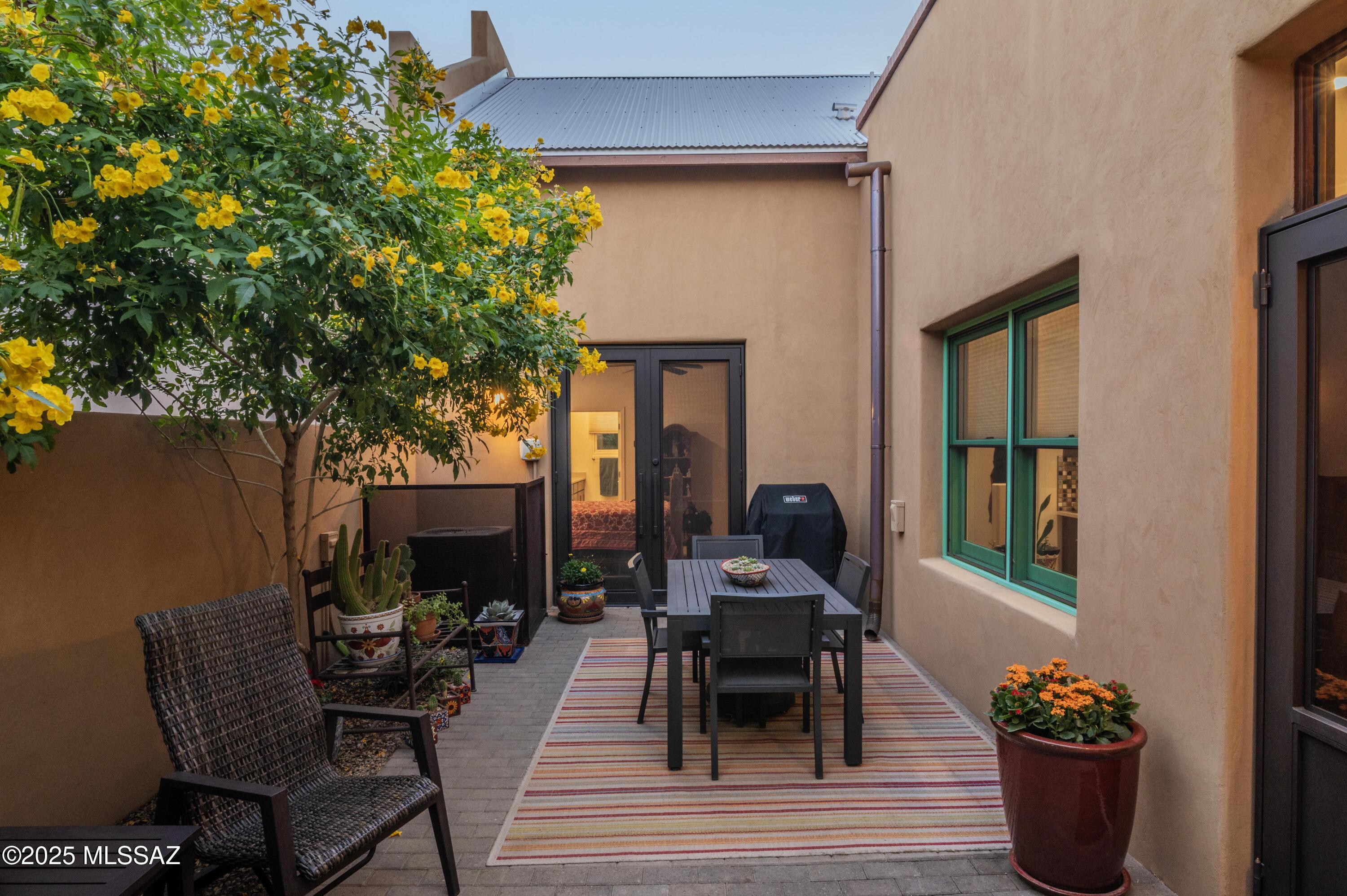 Seller is willing to offer up to $5,000 in concessions towards closing costs or rate buy down with an acceptable offer.

The perfect blend of comfort, style, and location in this beautifully maintained townhome. Situated in Tucson's historic Barrio Viejo, this residence offers bright, open living spaces, updated finishes, and a thoughtfully designed layout ideal for both everyday living and entertaining. 

The spacious main level features an inviting living area with abundant natural light, a well-appointed kitchen with modern appliances, a spacious master bedroom and a dining space that flows seamlessly to a private patio--perfect for morning coffee or relaxing evenings. Upstairs, two generous bedrooms provide a peaceful retreat. With its ideal location, timeless appeal, and upcoming neighborhood amenities, this townhome offers an exceptional opportunity to live comfortably while being connected to everything Barrio Viejo and downtown Tucson have to offer.