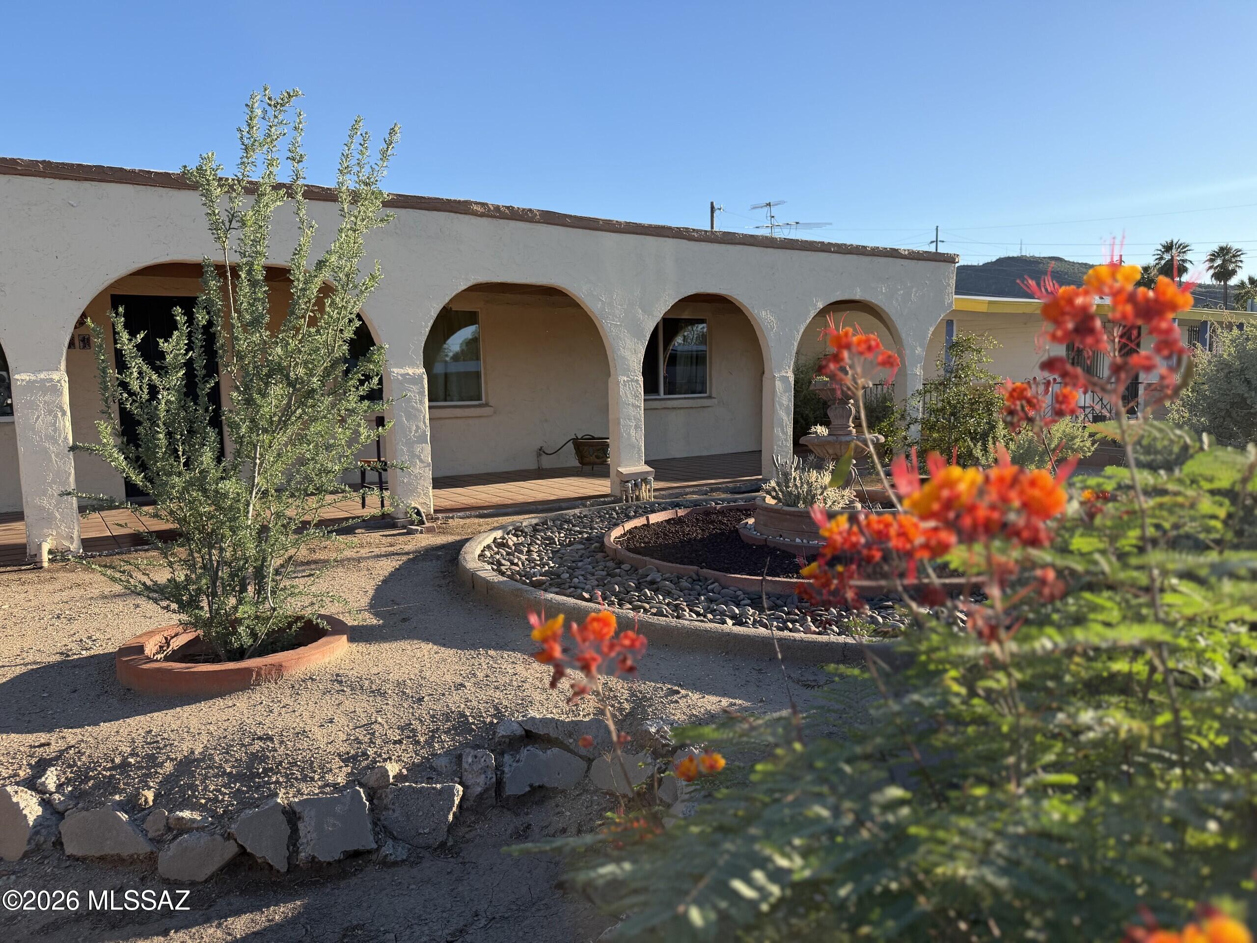 Located in Tucson's historic Menlo Park neighborhood, near A- Mountain, Tumamoc Hill, and St. Mary's Hospital! This home is a great opportunity for investors or buyers ready to create something truly special. Inside you'll find 3 bedrooms, 2 baths, tile flooring, extra kitchen cabinet space, and an Arizona Room, perfect for enjoying Tucson's weather. Outside there's a large enclosed back yard, gated front yard, carport, and plenty of parking. Full of character and potential, this fixer-upper is ready for your vision. Sold as-is.