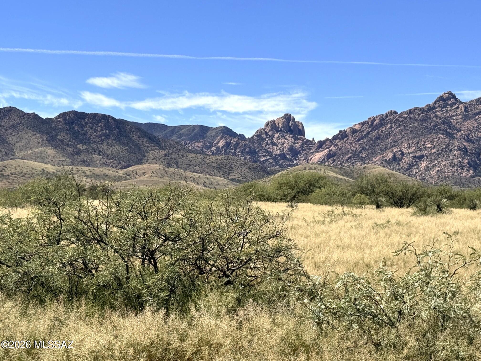 Perfectly situated lot offering spectacular 360 degree views and located just a short distance from the famous Cochise Stronghold. Enjoy easy access to hiking, rock climbing, horseback riding, birding, mountain biking and ATV/quad riding. This is an ideal location to build your dream home and enjoy the beauty and privacy of the surrounding Arizona landscape. With Arizona's abundant sunshine throughout much of the year, an off-grid home with solar is an excellent option giving you the opportunity to enjoy the freedom of generating your own power. Electric service is available at approximately 900', giving you the flexibility to create a home designed around your lifestyle and energy needs.