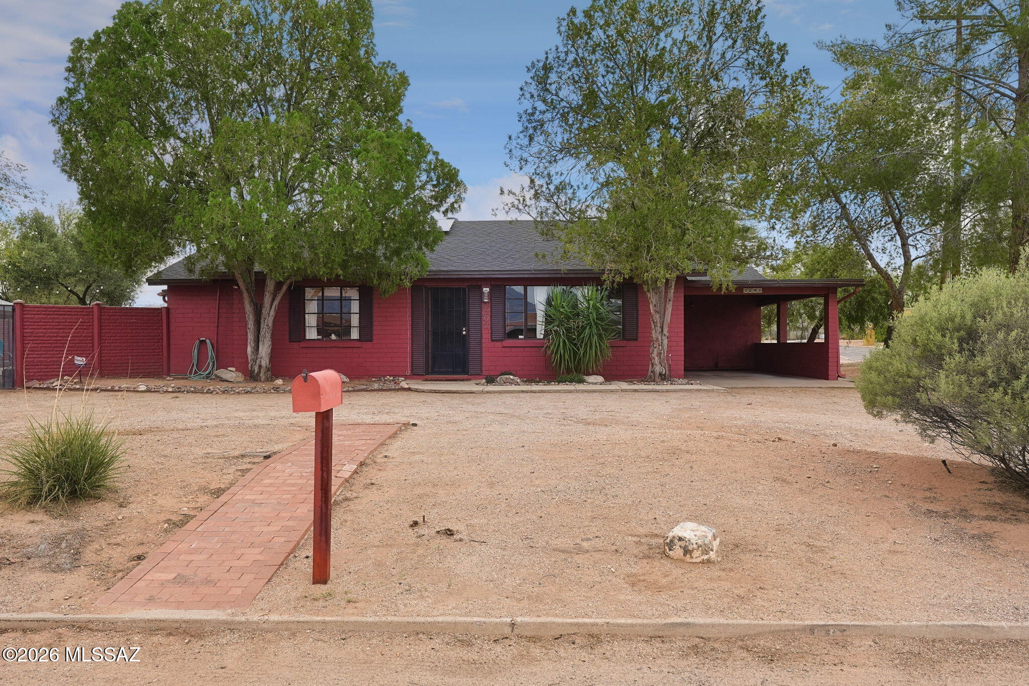 Rare multi-dwelling property on a premier 0.27-acre lot in desirable Grant Road Park. This versatile estate features a main house plus a guest house and studio. The solar-powered main home boasts Mexican tile floors, an inviting layout, and a primary suite with a SW-style bath, dual closets, and an attached office. Enjoy a spacious secondary bedroom and charming retro guest bath. Built for entertaining, the private oasis yard features a freshly plastered heated pool, outdoor shower, and covered brick-paver patio. Tucked into the landscape is a separate 2BR guest house with its own private yard, plus a separate studio casita with a private bath. A massive workshop offers abundant storage or hobby space. Central convenience meets unmatched versatility!