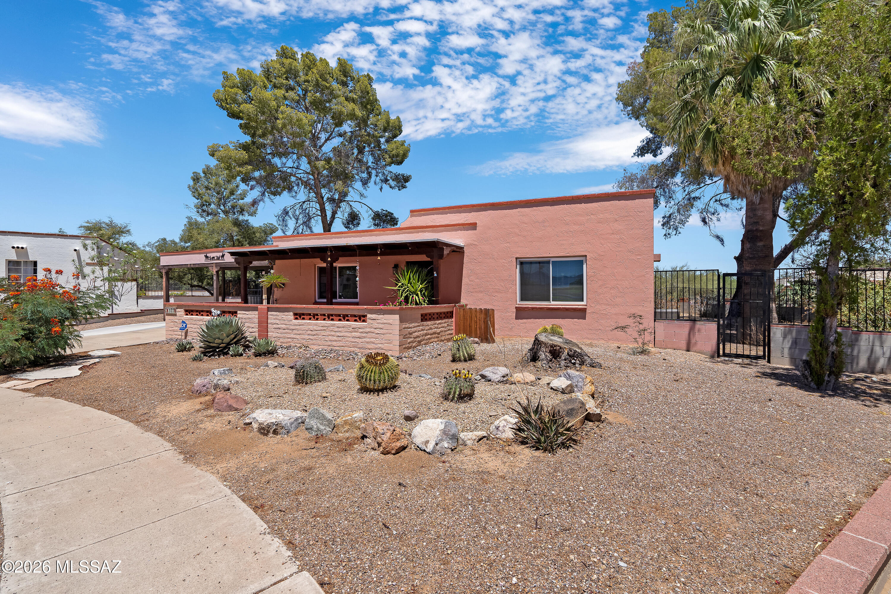 This 3-bed, 2-bath, 1,616 sq ft Green Valley gem offers an unbeatable location -- just two blocks from I-19, The Haven Golf Course, shopping, and GV Rec East Center. Sip your morning coffee on the front patio while taking in relaxing mountain views. Inside, the enclosed Arizona room adds flexible living space year-round. The generous .34-acre lot gives you room to garden, landscape, or simply spread out. Green Valley Rec membership opens the door to 14 activity centers with pools, spas, fitness rooms, pickleball, art classes, billiards, card games, and live performances. Low HOA dues make ownership very attractive. With this footprint, lot size, and location, the value here is hard to beat. This home is not on the main Abrego Rd - it is on a cul de sac off main road. No road noise inside