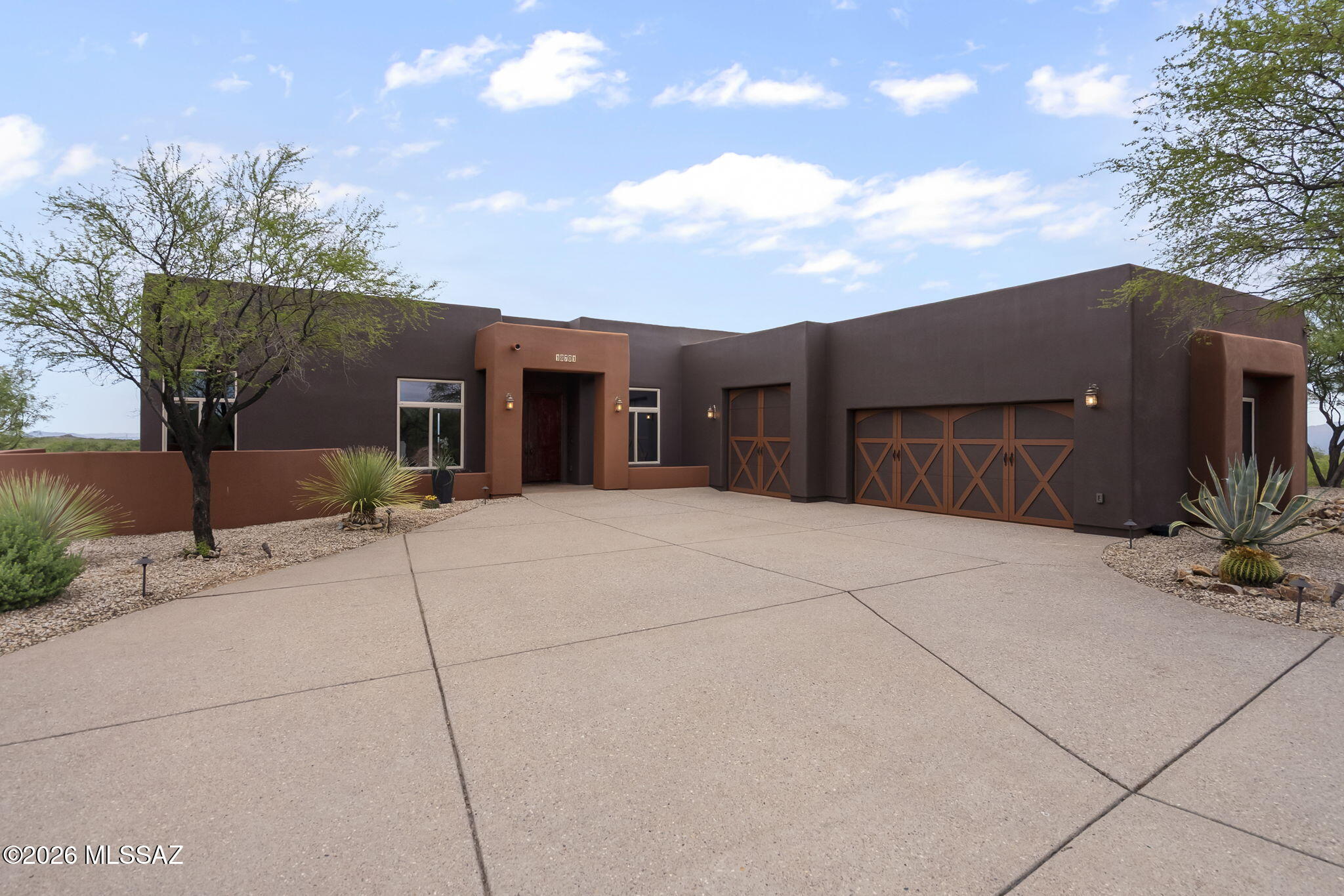 Live where you land!  This stunning, custom-built southwest=style home offers spectacular, unobstructed views of the Catalina, Rincon, Santa Rita, and Siierrita mountain ranges   Situated on 15,97 acres in the sought-after Ruby Star Airpark community, this one-level, 4-bedroomm, 3-bathroom home features stamped concrete floors, custom cabinetry, concrete countertops, a 2yr old HVAC system and an attached 3 car garage.  A detached 2880 square-foot hangar with an attached studio apartment offers direct access to the private community airstrip- a 4,300' paved runway with a 12,500 lb. max weight capacity.   Enjoy the privacy and serenity of acreage living paired with the convenience of fly-in access, all within a secure gated setting.
Owner/Seller has AZ real estate license