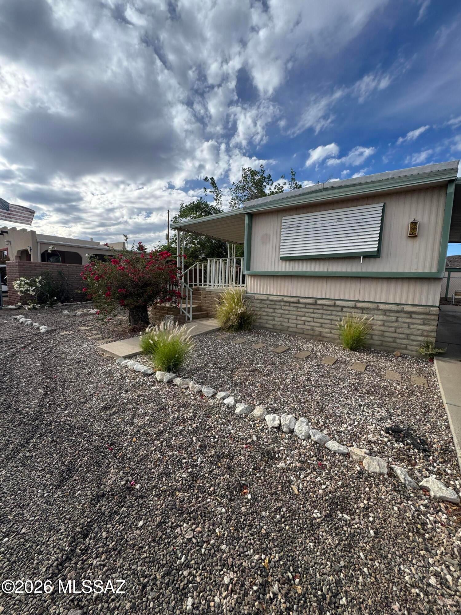 Welcome to Tucson Estates! This 2 bedroom, 2 bath home offers an open concept layout with a split bedroom floor plan and a unique expansion that adds valuable space to the dining and living areas. With a little TLC, this home has the opportunity to shine and offers a great canvas to make it your own. Enjoy the many amenities of this desirable active adult community, including a pool and spa, golf course, tennis courts, shuffleboard, exercise facility and so much more. An excellent opportunity for those looking for affordable living, community amenities, and the chance to add their own personal touches.
Sold AS-IS.