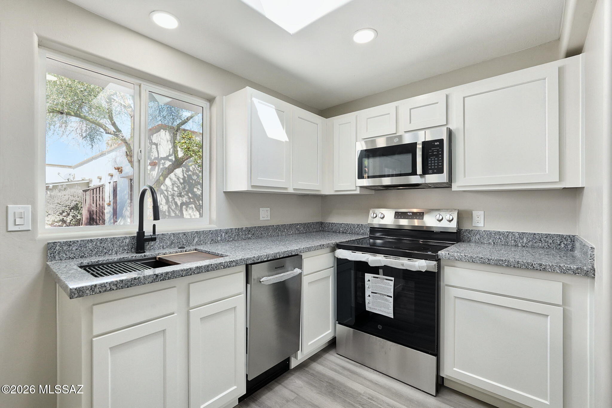 BEAUTIFULLY REMODELED ONE-BEDROOM VILLA IN VILLAS EAST!
Welcome to this completely remodeled one-bedroom villa in the desirable Villas East community! This rare home has been updated throughout and offers modern finishes, comfortable living, and convenient accessibility.
The beautifully remodeled kitchen features new cabinets, granite countertops, a new sink with disposal, stainless steel dishwasher, oven, and plenty of additional cabinet storage. A gorgeous skylight brings in an abundance of natural light, making the kitchen bright and inviting.
The spacious bedroom offers a rare in-unit washer and dryer hookup with a dedicated closet, providing added convenience. The completely remodeled bathroom includes additional cabinet storage and updated finishes. New flooring throughout and wide doorways add to the home's comfort and accessibility.
Located in the Green Valley area, residents can enjoy the incredible lifestyle and amenities available through Green Valley Recreation (GVR), including numerous recreation centers, swimming pools, fitness facilities, tennis and pickleball courts, golf, clubs, classes, and countless activities and social opportunities.
There is simply too much to list! This is a rare opportunity to own a beautifully remodeled one-bedroom villa in Villas East. Come see all this home has to offer!