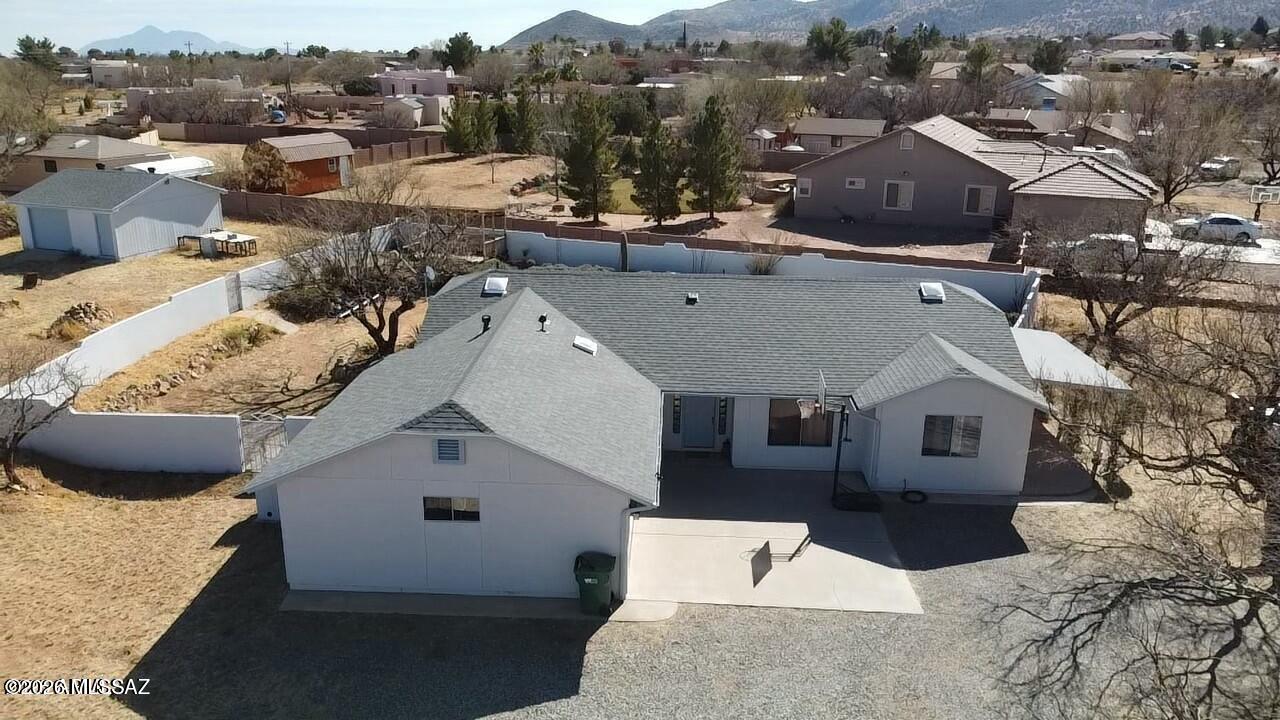 Antelope Run beauty with large lot and majestic views of the surrounding mountains. This family home has something for everyone. Large bedrooms with ample closet space, amazing kitchen with eat in dining and a pool and patio area for the kids. For those that need more space for toys and storage, there is a detached shop to the east in its own gated yard. This home has high ceilings, granite counters throughout and plenty of living space for the family. surrounded by large trees that cover the driveway up to the house, this house also has an attached carport. Many recent upgrades for worry free living. Newer roof for worry free monsoons and upgraded flooring for those high traffic families. Primary bedroom split from other bedrooms and has a soaker tub with separate shower and large closet