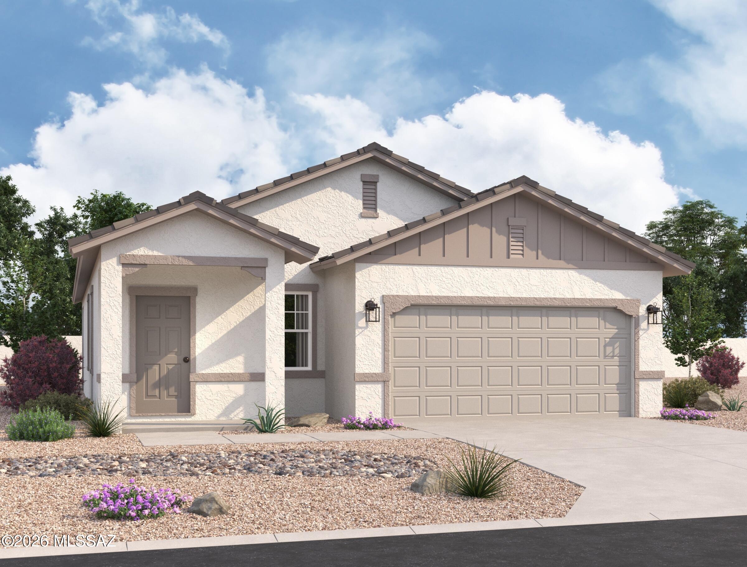 Our Sterling plan sits right across from the park area with great views and beautiful sunsets!  3 Bedrooms and 2 Baths make this quaint home a charmer!  Large island in the kitchen too!  Beautiful, brand-new homes featuring thoughtfully designed floorplans in the scenic Tucson community of Star Valley! Conveniently located with easy access to I-19 and major Tucson destinations, this community offers the perfect balance of comfort, convenience, and outdoor living. Homes showcase desirable upgrades including 9' ceilings, white shaker cabinets, Shaw 17'' x 17'' tile flooring, and granite kitchen countertops. Each home comes move-in ready with stainless steel kitchen appliances, including a refrigerator, washer, and dryer. Energy-efficient features include Low-E dual-pane windows and a Wi-Fi programmable thermostat to help maximize comfort and savings. Exterior highlights include front yard desert landscaping with irrigation, covered patios, and spacious backyards designed for enjoying Tucson's beautiful sunsets. Residents enjoy community amenities including large park with soccer fields; walking paths and natural trails; children's play area; basketball courts; tennis courts; pickleball courts; natural-area dog park and incredible mountain views everywhere! This welcoming community offers the perfect combination of modern living and the natural beauty of the Tucson desert.