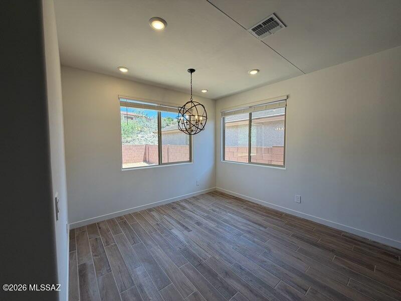 Oro Valley. Move in Ready. Energy Efficient. 

This stunning home features 4 bedrooms, 2.5 baths, and a tandem garage, offering both flexibility and modern appeal. The spacious great room flows effortlessly to a covered patio--perfect for entertaining or unwinding. Located in the highly desirable gated community of Naranja Trails in Oro Valley, just across from scenic Naranja Park, residents enjoy stylish gourmet kitchens, spa-like primary suites, and beautiful walking trails. Thoughtfully built with innovative, energy-efficient features, this home delivers lasting comfort, savings, and peace of mind.