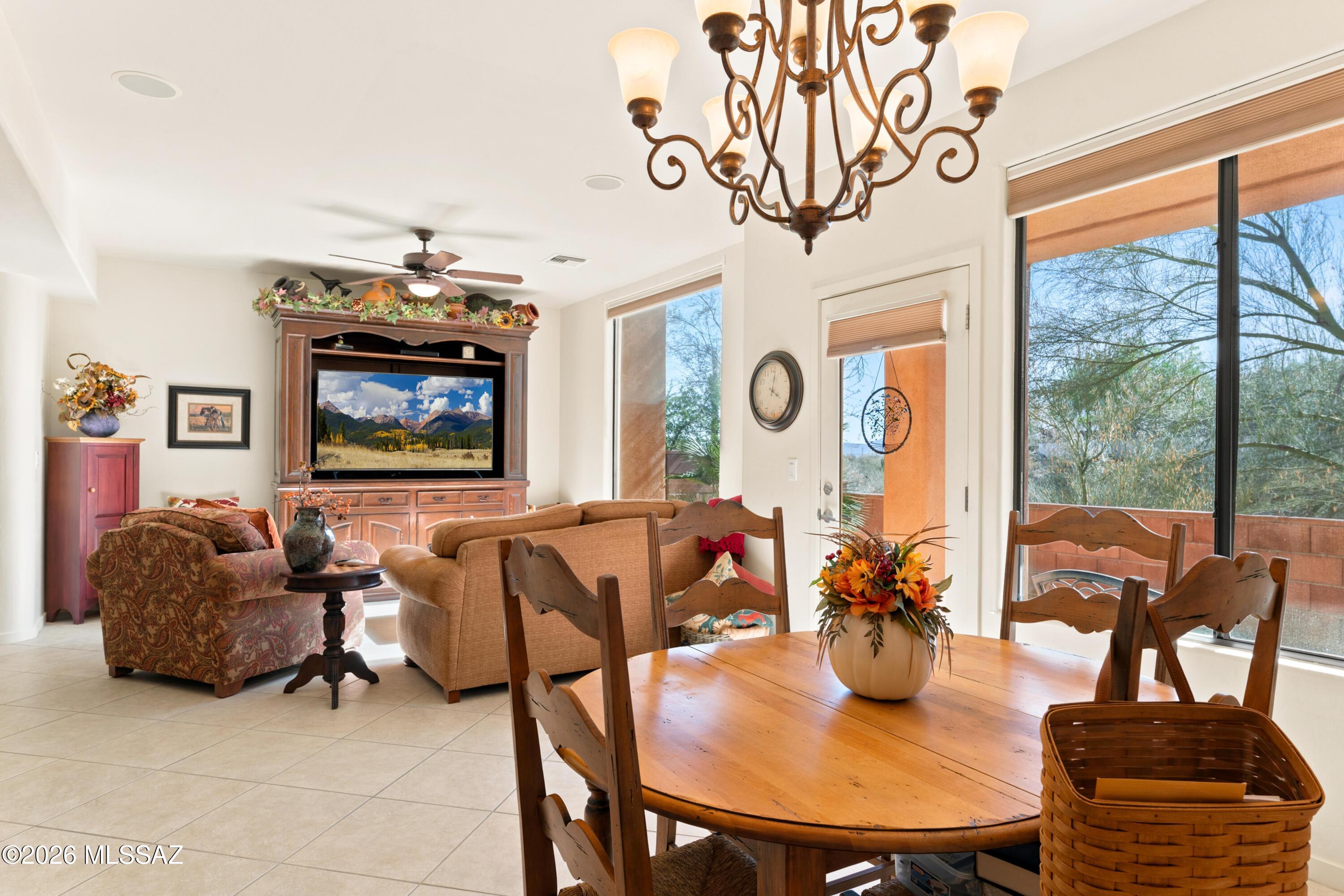 Rare Foothills opportunity under $500K! Tucked within a small, desirable community of fewer than 50 homes, this nearly 1,800 sq. ft. townhome offers the ideal blend of privacy, convenience, and low-maintenance living just minutes from La Encantada, premier dining, shopping, and the best of Tucson's Foothills lifestyle.

The home features 2 bedrooms, 2.5 baths, and two spacious primary suites. Interior highlights include granite countertops, upgraded cabinetry, stainless steel appliances, 18-inch tile flooring downstairs, and comfortable carpet in the upstairs bedrooms and office area. Wake up to beautiful mountain views from one bedroom, or enjoy your morning coffee from the private balcony overlooking a natural desert buffer from the other. A truly peaceful setting where Tucson's desert wildlife is often on display.

The community offers a lovely pool area with a ramada, a small fitness area, and a quiet, low-density setting. Recent updates to the home include an A/C and water heater, both replaced approximately four years ago. The HOA covers exterior painting, front yard landscaping, trash and recycling pickup, pool maintenance, and the fitness area.

Sellers may consider selling the home furnished, making this an excellent turnkey Foothills option.