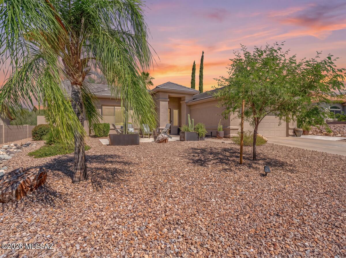 Welcome to your own private oasis! Step inside this home and experience a warm and inviting welcome with distinctive Southwest character. The open concept layout seemlessly connects the great room and dining room space to the well appointed kitchen creating a warm and welcoming gathering place. Large windows and sliding glass doors fill the room with natural light while offering peaceful views of the beautifully landscaped outdoors. Front and rear travertine paver patios create the perfect setting for morning coffee, intimate gatherings, or relaxing beneath the sunny desert sky. From both venues, you can enjoy the abundant wildlife that visits the property on a regular basis. The current owners have done all the upgrades including new windows, roofs, kitchen cabinets, appliances, and flooring leaving the new owners plenty of opportunity and time to enjoy desert living and all the activites that the special community of Saddlebrooke offers. Come and make this your forever home.