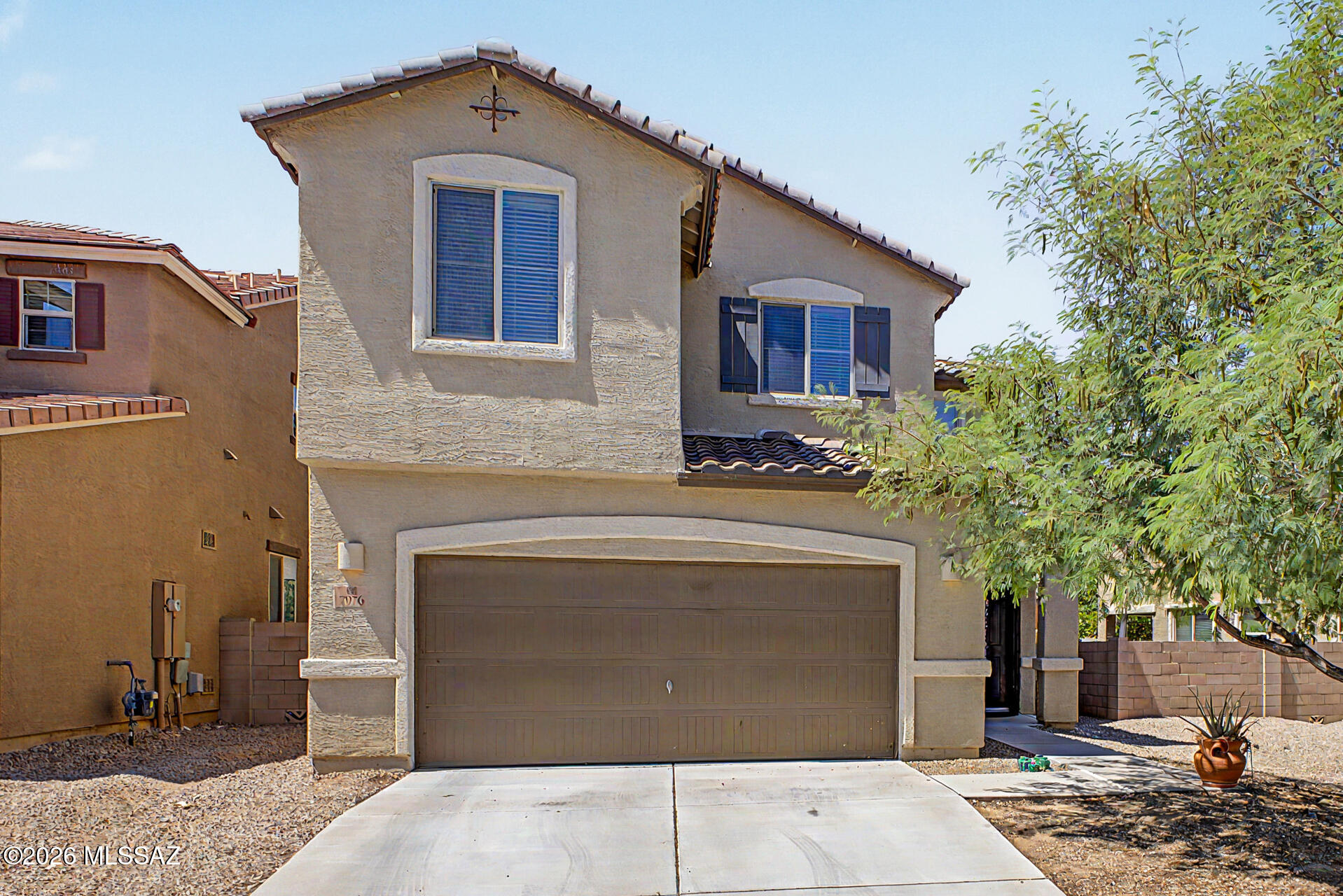 Nestled in the highly sought-after and award-winning Vail School District, this stunning home offers the perfect blend of comfort, style, and location. Situated on a premium lot with no neighbors behind, you'll enjoy peaceful views overlooking a beautiful common area and park-like setting. Conveniently located near the interstate, commuting is effortless while still enjoying the tranquility of the neighborhood.

Inside, the home welcomes you with soaring high ceilings, elegant tile flooring, granite countertops, and sleek stainless steel appliances

 Upstairs, you'll find four spacious bedrooms along with an expansive loft/living area Truly a must see!!