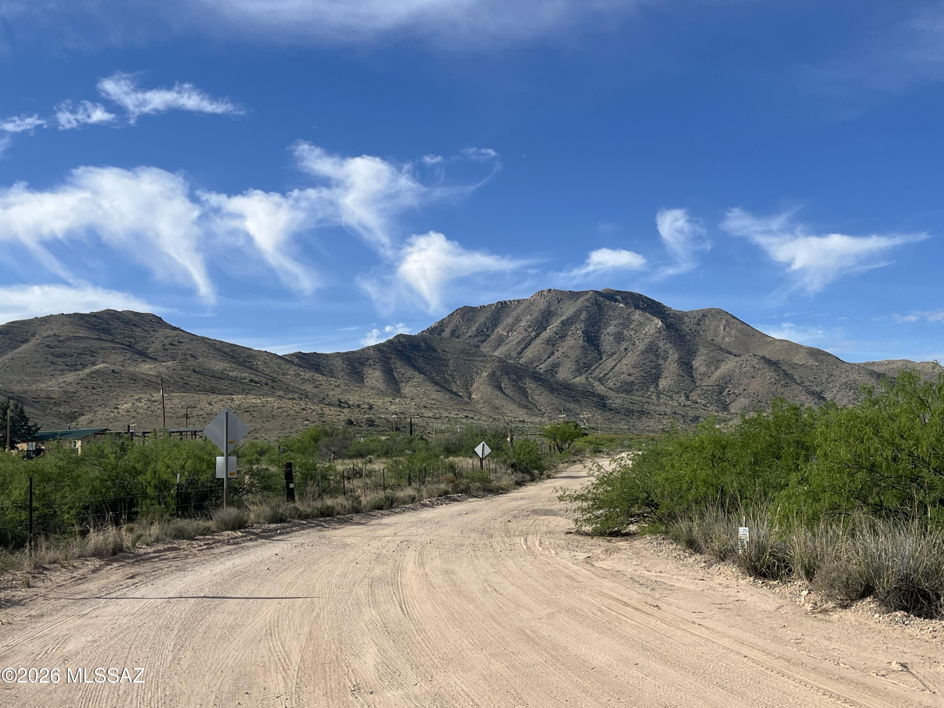 Beautiful manufactured home with NEW Metal ROOF, 2 New Baths, New kitchen, Great room with wood burning stove, New windows, Large NEW deck off Master sweet to enjoy the stars at night. New sliding doors, New windows, New flooring, front and back porches. 2 Car garage with washer/drier, storage etc.