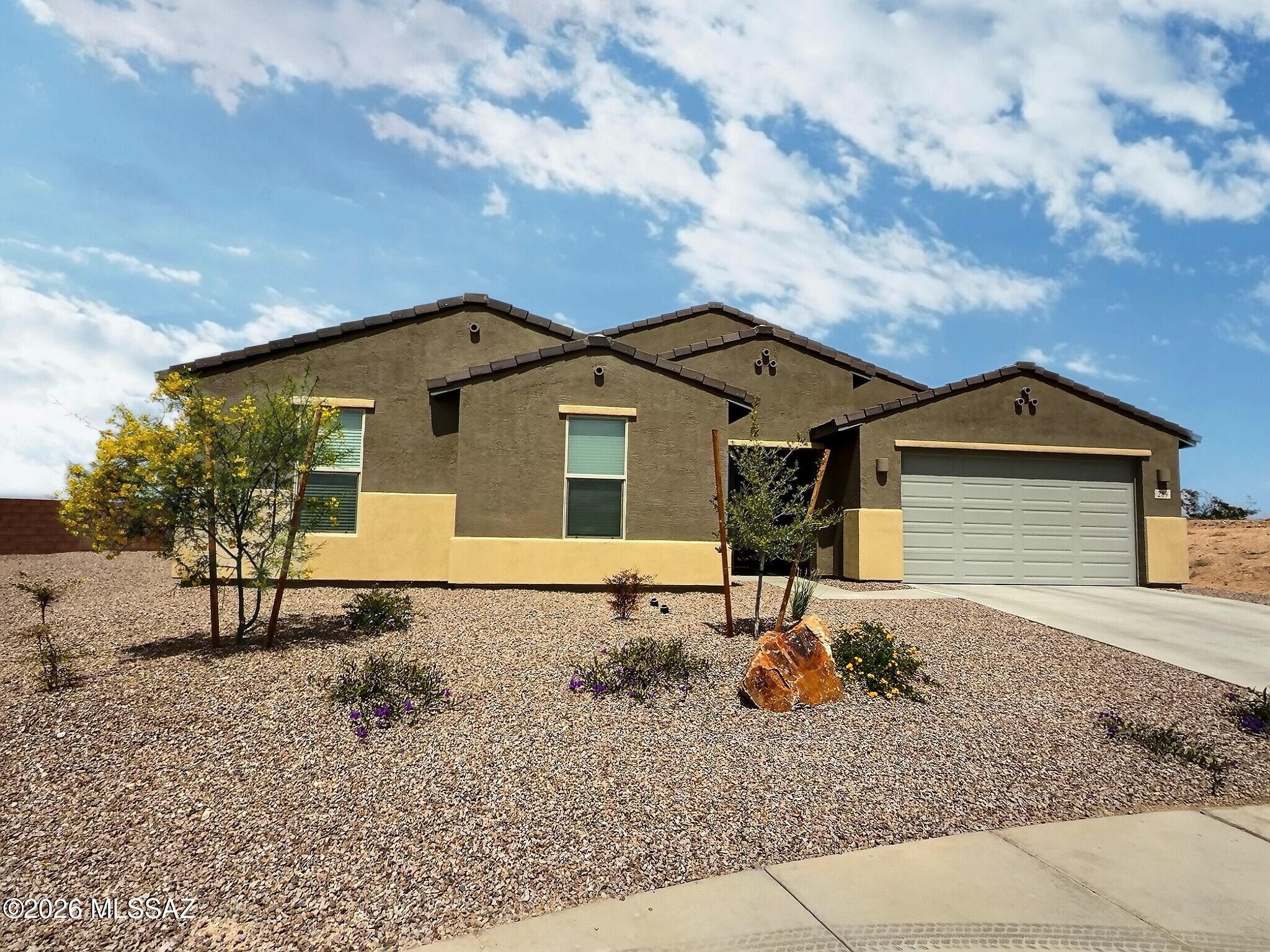 Welcome to this spacious 4-bedroom, 3-bath home in Sahuarita, Arizona. Offering 3,040 sq ft, this property features an open-concept layout with a bright living area and a well-equipped kitchen with ample counter space and cabinetry. The large primary suite includes a private bath and walk-in closet, while additional bedrooms provide flexibility for family, guests, or a home office. The backyard offers plenty entertainment with a basketball/pickleball court, a gazebo and putting green. its an beautiful outdoor retreat. Conveniently located near schools, parks, shopping, and dining, this home combines comfort, space, and everyday convenience.