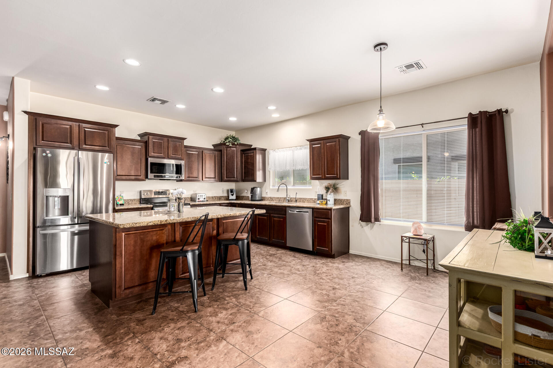 Priced at just $175 per square foot compared to the neighborhood average of $207 per square foot, this home offers an exceptional value and a rare opportunity in today's market. Welcome to this beautifully appointed 3 bedroom, 2.5 bath home w/ den in the sought after Saguaro Bloom community in Marana. Designed w/ a split bedroom floor plan for added privacy, this home features granite countertops in kitchen, stainless steel appliances, and a spacious kitchen island ideal for culinary enthusiasts, gathering, and everyday living. Soft, neutral earth-tone paint creates a warm, calming atmosphere throughout. The open concept great room flows effortlessly to the backyard, perfect for entertaining. Step outside to a thoughtfully designed yard with pavers, mature cacti, a lemon-orange hybrid tree and lush landscaping. An inviting retreat to enjoy your morning coffee or unwind with an evening cocktail under Arizona's stunning skies and breathtaking sunsets. A perfect blend of comfort, style, and easy living. Enjoy Saguaro Bloom's resort style amenities including a refreshing pool and splash pad, fully equipped fitness center, welcoming recreation center, and fun community events like local food trucks.
6/19/26 - Seller replaced HVAC contactor, start capacitor, and hard start kit.