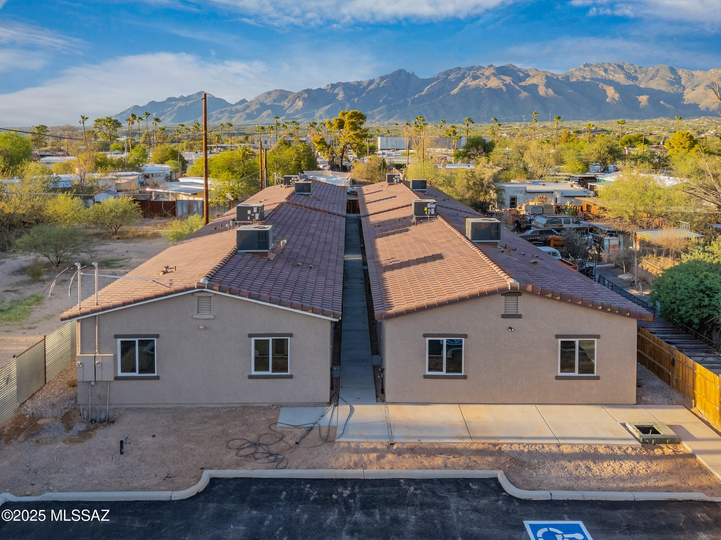 INCOME GENERATING PROPERTY * * *. * * * 4 NEW CONSTRUCTION DUPLEXES. -Four units 3 Bedroom 2 Bath 1079 Sq Feet and -Four Units 2 Bedroom 1 Bath 803 Sq Feet. Total of 8 Units. Great Investment opportunity ! Beautiful Granite counters through out home, new stainless steel appliances, tile in all areas. Parking lot with EV Ready Outlets. Close to University of Arizona and I-10 for easy commuting as well as shopping around the corner.