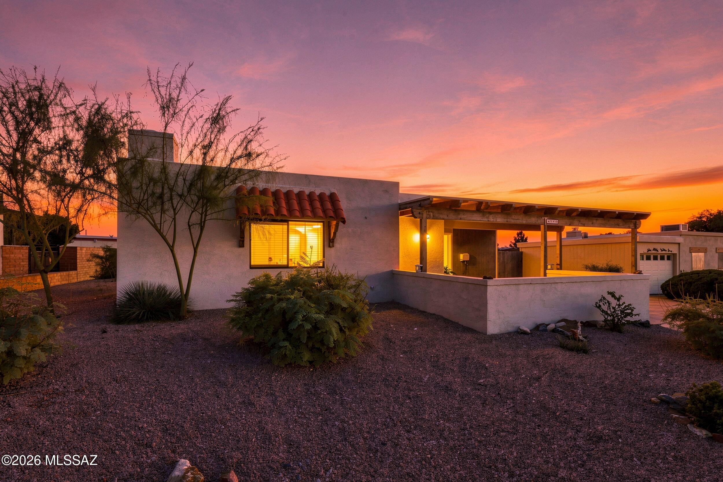Beautifully updated home with mountain views! Remodeled in 2021, this spacious residence features open living areas with stylish tile plank floors, fresh paint, updated lighting, and ceiling fans. The home features new interior doors, hardware, baseboards, a charming beehive fireplace, and dual-pane windows throughout. The modern kitchen features stainless steel appliances and elegant granite countertops. The large owners suite includes a walk-in closet and an updated bathroom with a walk-in shower. The guest bath has also been tastefully updated. Enjoy a generous laundry room with ample space for custom storage solutions. Step outside to a backyard retreat with a covered patio, extended paver patio, and a lush, easily maintained yard with mature trees and shrubs. The versatile bonus room provides extra space for hobbies, work, or relaxation. Separate HVAC systems for the main living areas and the bonus room, both replaced in 2021, ensure year-round comfort.