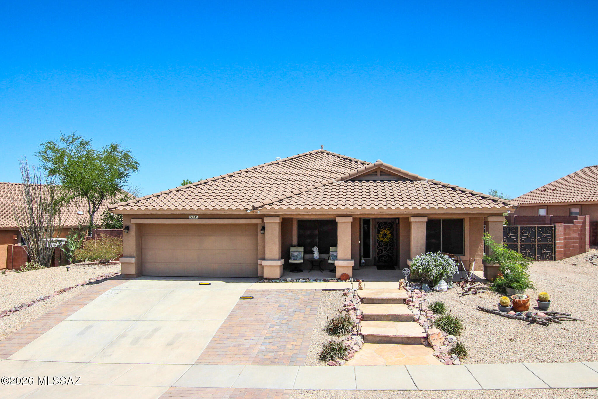 $10,000 PRICE REDUCTION... Beautifully remodeled 4 bed, 2 bath home on a spacious 0.21-acre cul-de-sac lot in the A+ rated Vail School District! Features include a remodeled kitchen, new flooring throughout, updated bathrooms, tankless water heater, solar system, solar screens, reverse osmosis, and soft water system. The backyard is an entertainer's dream with pool & waterfall, hot tub with steps, pergola, outdoor kitchen, expanded brick patio with retaining wall, mountain views, natural preserve/open space behind, and view fencing. Includes shed, drive-through gate, and extended-depth 2-car garage.
Enjoy the perfect blend of comfort, upgrades and outdoor living. This is Arizona living at its finest. Schedule your private showing today to experience it for yourself!