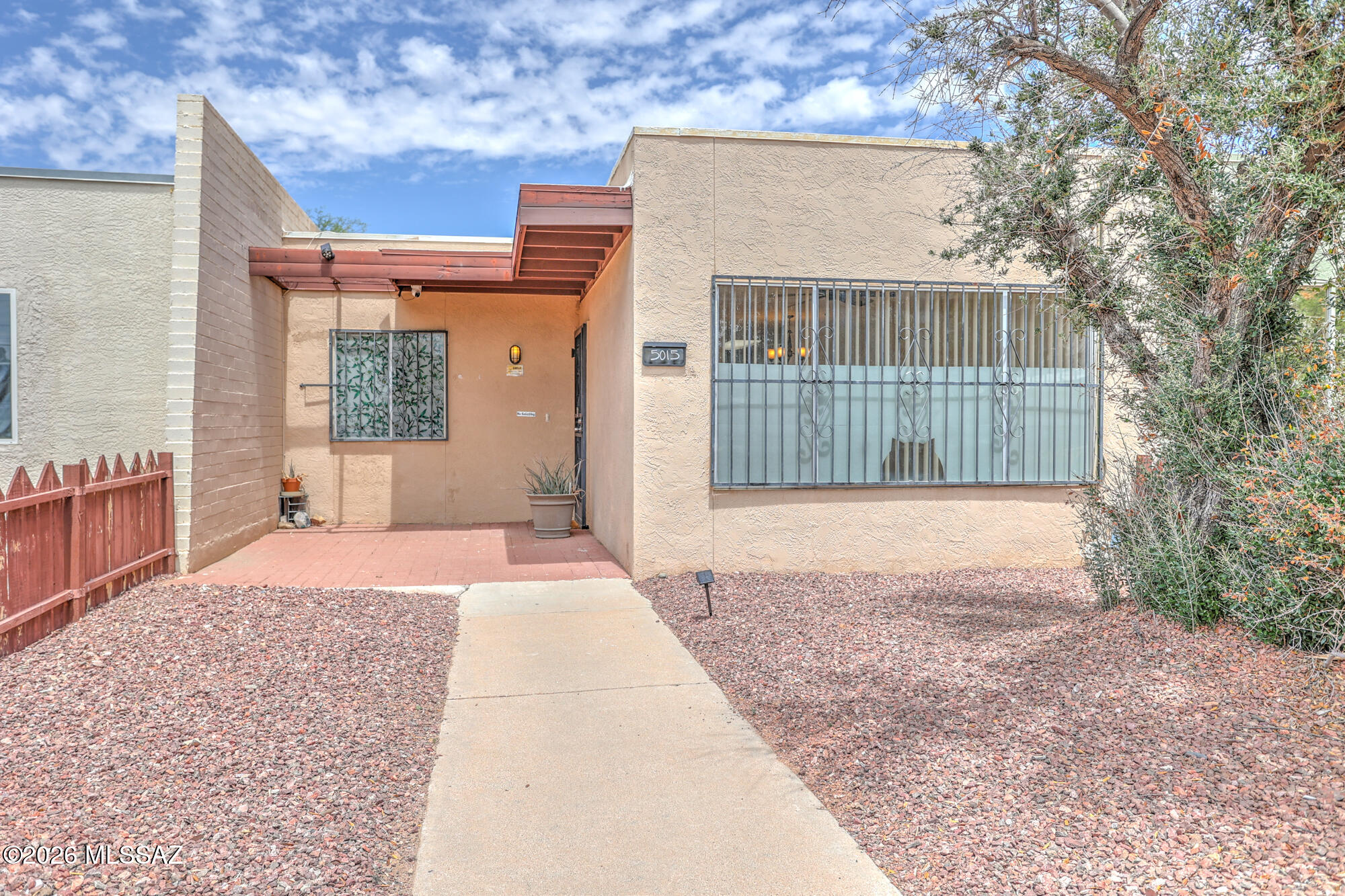 Come check out this adorable 3bed/2bath Townhome  located centrally close to restaurants, shopping, and schools, with ceramic tile throughout, with skylights that brightens the home, with a great open layout and with nice size bedrooms, this Townhome works for everyone, with an adorable and low maintenance front yard and an even cuter backyard this one is for you, with an outback laundry room/storage room with washer and dryer already and your two car covered carport right behind your property you can't go wrong, also Priced to sell, hurry so you don't miss out on this beauty.