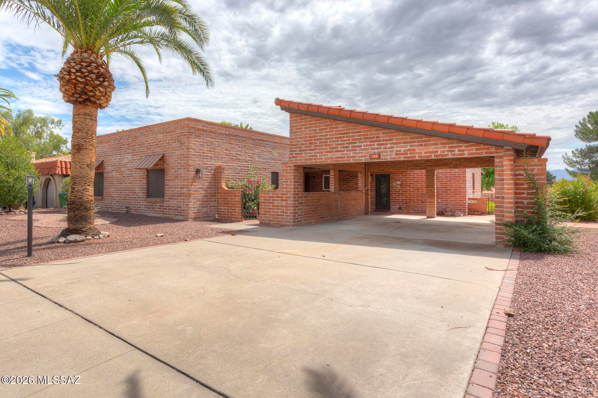 Welcome to Green Valley Country Club Estates This Beautiful home with Mountains and Golf Course Views. Plenty of room with 3 bedrooms 2 baths, bonus room, Az room and large double carport. Beehive fireplace in living dining area. Kitchen has tile counters and stainless-steel appliances with breakfast nook. Custom security at entry and kitchen doors. Sunscreens and new HVAC gas pac  and gas water heater install 2024. Washer and Dryer 2023.
