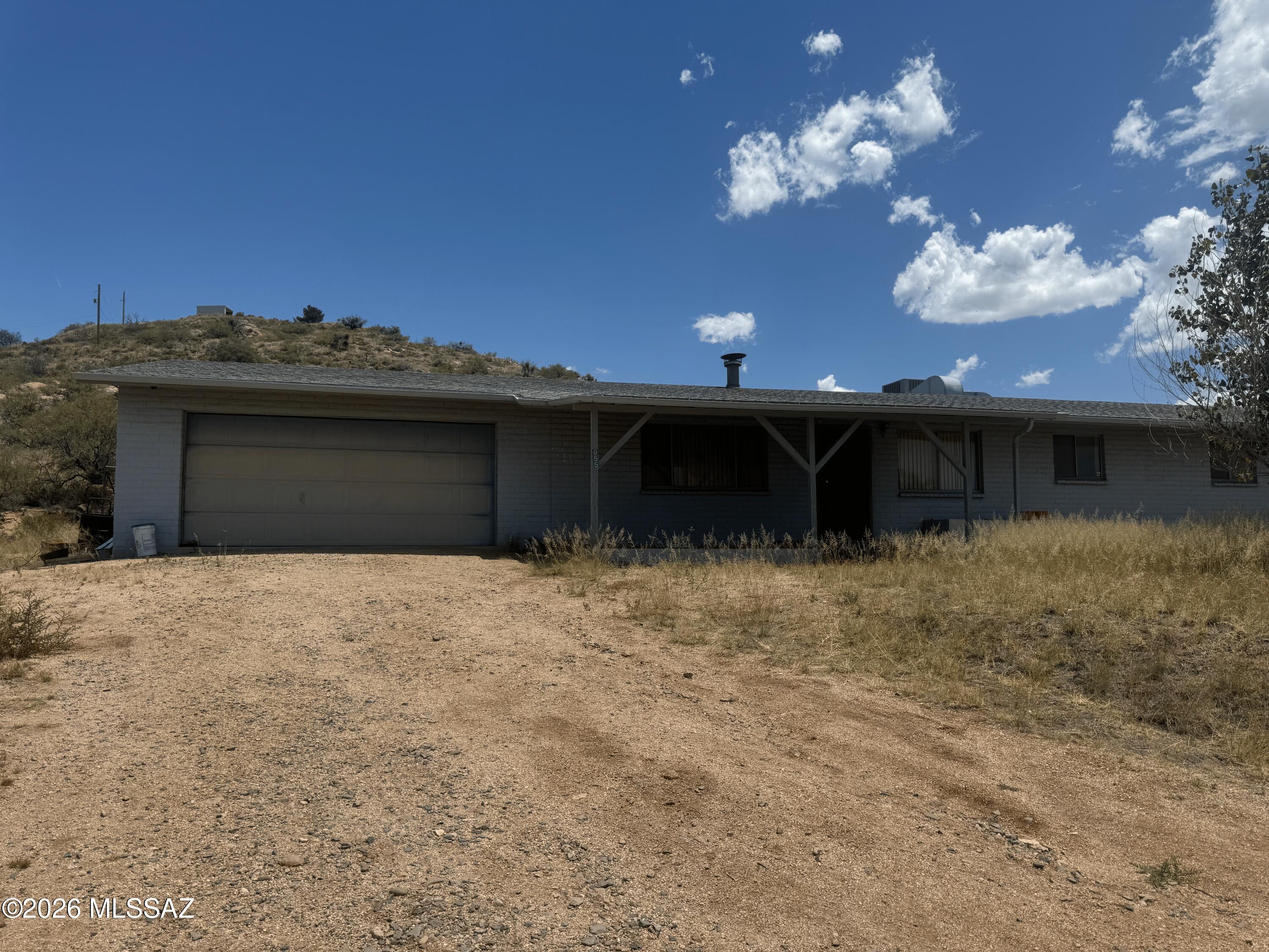 Welcome to the 3 bedroom 2 bathroom home on 1.25 acres in quiet Oracle.