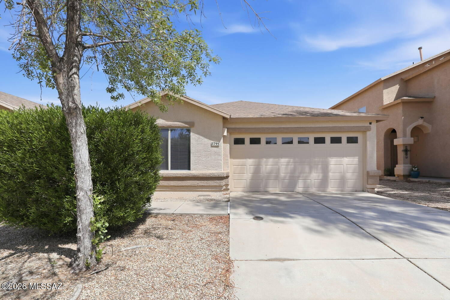 Welcome to this charming 3-bedroom, 2-bath Reszi home at 7795 S Sentinal Stone Drive in Tucson. Offering 1,466 sq ft of thoughtfully designed living space, this home features an open-concept layout perfect for comfortable living and entertaining. The kitchen flows into the bright living and dining areas. The primary suite includes a private en-suite bath and generous closet space, while two additional bedrooms offer flexibility for family, guests, or a home office. Enjoy natural light, neutral finishes, and a low-maintenance backyard. Conveniently located near shopping, dining, parks, and major roadways.