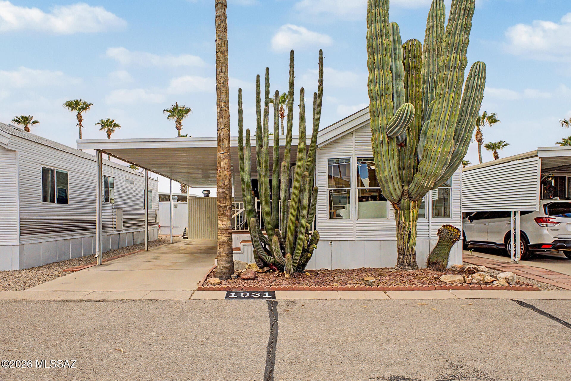 Dream Home Alert!  2 Bed 1 Bath located in Tucsons Premier Rincon Vista 55+  community. Charming 2-bedroom mobile home is now on the market w TONS of Updates and fully furnished. New interior paint 2025. NEW roof 2023. Updated Pex plumbing. Come and be greeted by a cozy covered deck ideal for morning coffee and convenient carport parking. Inside, you'll find an inviting layout with updated flooring, vaulted ceilings, abundant natural light, and a soft palette that makes every space feel warm and welcoming. New interior paint 2025. NEW roof 2023. Updated Pex plumbing. Rincon Vista amenities include a pool, spa, pickleball & fitness facilities, just to mention a few! Don't miss this one! Buyer must Apply w/ Rincon Vista and be approved to purchase. Lot Rent Paid yearly: 767$ per month.