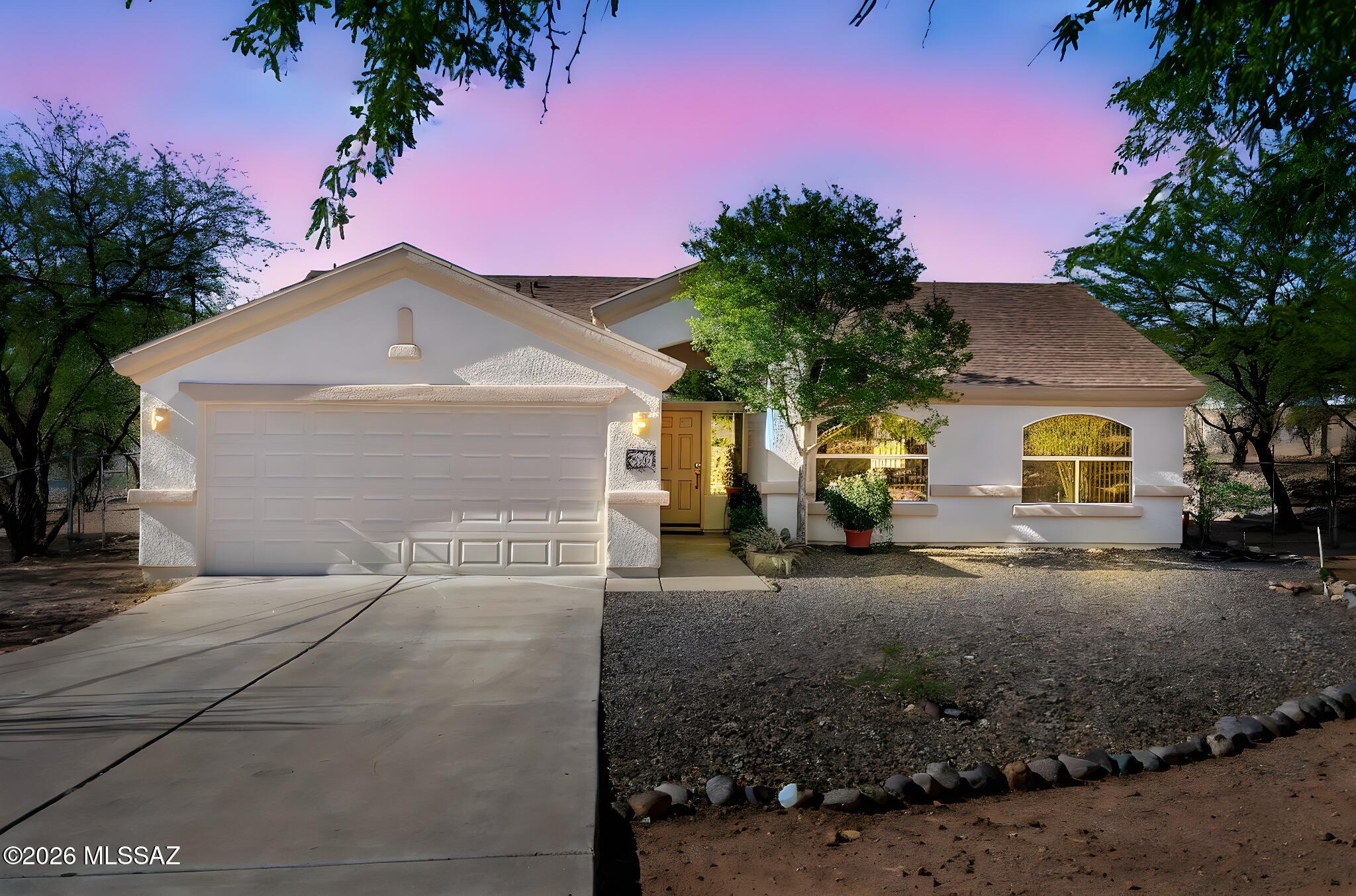 Discover the perfect blend of comfort, space, and scenery in this beautiful Rio Rico home! Featuring 3 spacious bedrooms and 2 bathrooms, this property sits on nearly an acre of land, offering privacy and room to grow. Enjoy breathtaking views right from your backyard, ideal for relaxing evenings or entertaining guests. Conveniently located near schools, local shops, and everyday essentials, with easy access to the freeway for a smooth commute. Whether you're looking for your first home or a peaceful retreat, this property delivers lifestyle, location, and value all in one. Don't miss this opportunity to own a slice of Southern Arizona charm!