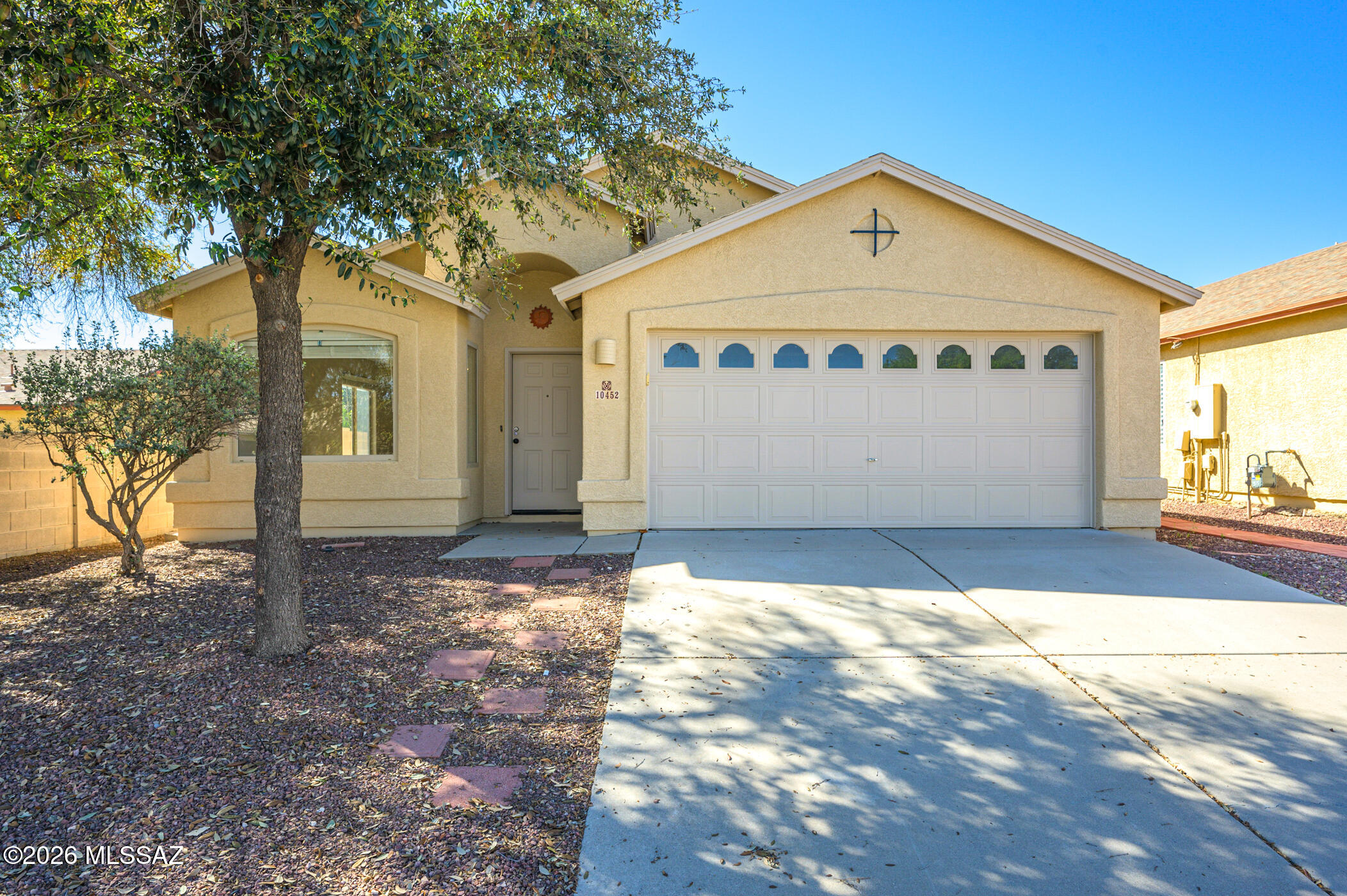 Come see this fantastic, well-maintained home featuring 4 bedrooms, 2 bathrooms, a living room, and an open kitchen, dining, and family room layout that creates a comfortable flow for everyday living. The property has been freshly painted and features new LVP flooring in the bedrooms, with tile flooring in the kitchen, bathrooms, and entryway for easy maintenance. The kitchen and bathrooms have been updated with new cabinets and countertops, giving the space a clean, refreshed look. Step outside to a covered back patio with extended pavers and a low-care gravel yard, with a nice setup that works well for a garden.