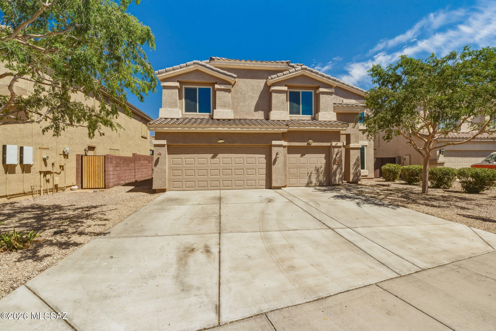 Sparkling pool, owned solar, new energy efficient windows and a home spacious enough for guests or multigenerational living. PCSing to Luke AFB from DM... this is an amazing location for you! This stunning property offers a convenient main-floor bedroom and full bathroom, perfect for guests or multi-generational living. Upstairs, you'll find a large loft, six additional bedrooms, and two full bathrooms, including a generously sized primary suite. Enjoy multiple living spaces with both a family room and formal living room, along with an eat-in kitchen and formal dining area--ideal for everyday living and special occasions alike.